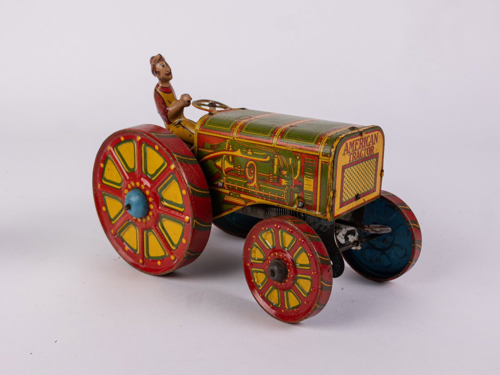 1920's Louis Marx & Co. Tin American Tractor: 1920's Louis Marx & Co. Tin American Tractor Size 6" x 5" x 8" Literature Brooks Auction – Online Auction Terms & Conditions Contact: (856) 694-2960 | info@brooks.auction READ BEFORE YOU BID