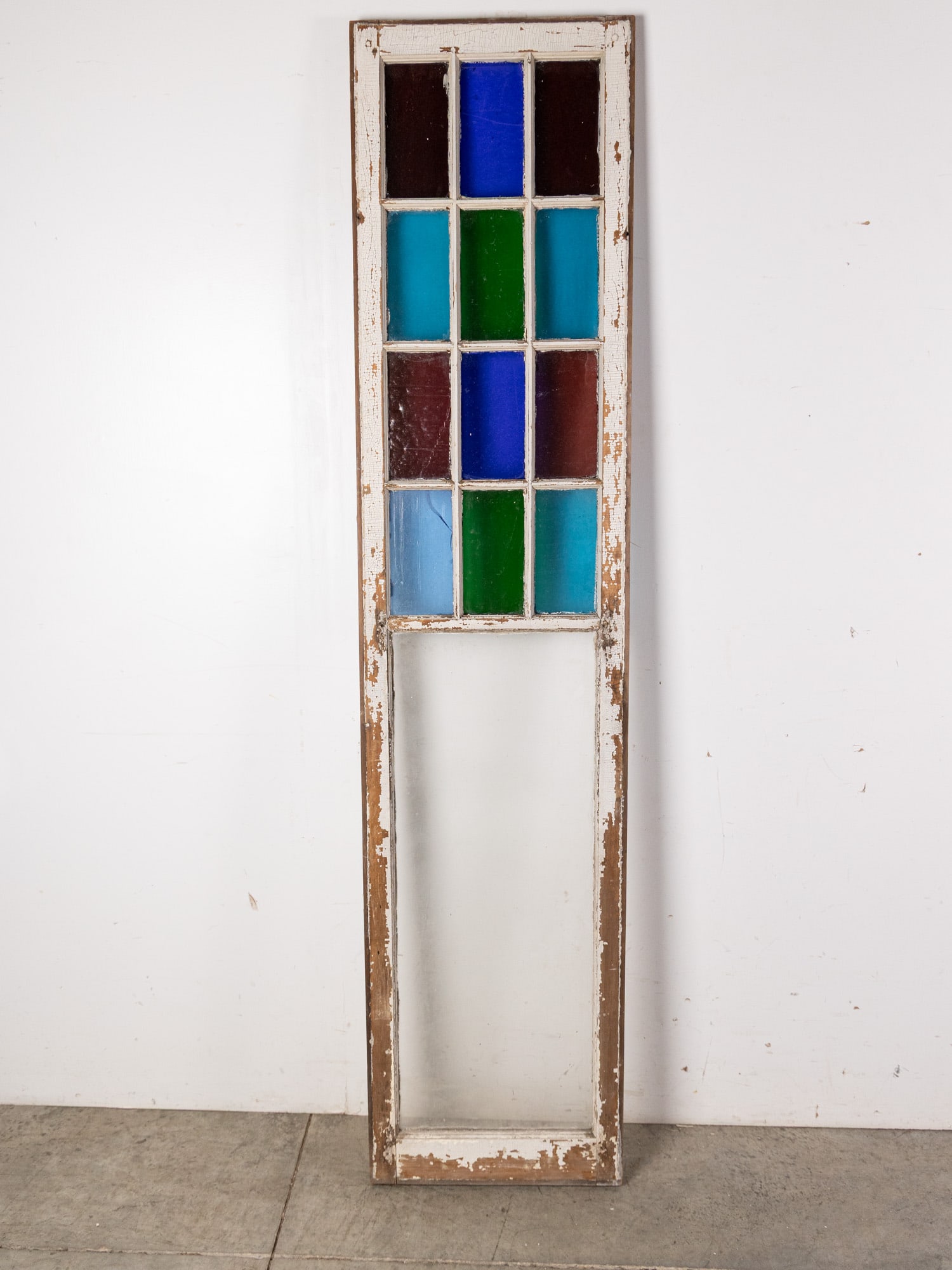 Antique Stained Glass Panel: Antique multi-color stained glass window panel. Seems to be one interior crack on the lower blue panel Size 78" x 18" Literature Brooks Auction – Online Auction Terms & Conditions Contact: