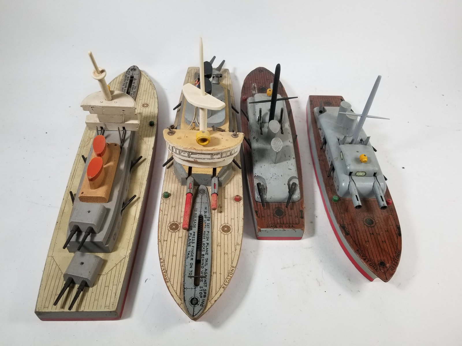 (4) Keystone Wood Toy Boats ft. B-20 U.S. Battleship: B-22 U.S. Battleship, (2) B-15 U.S. Battleship, & B-20 U.S. Battleship Size 7" x 12" x 12" Literature Brooks Auction – Online Auction Terms & Conditions Contact: (856) 694-2960 |