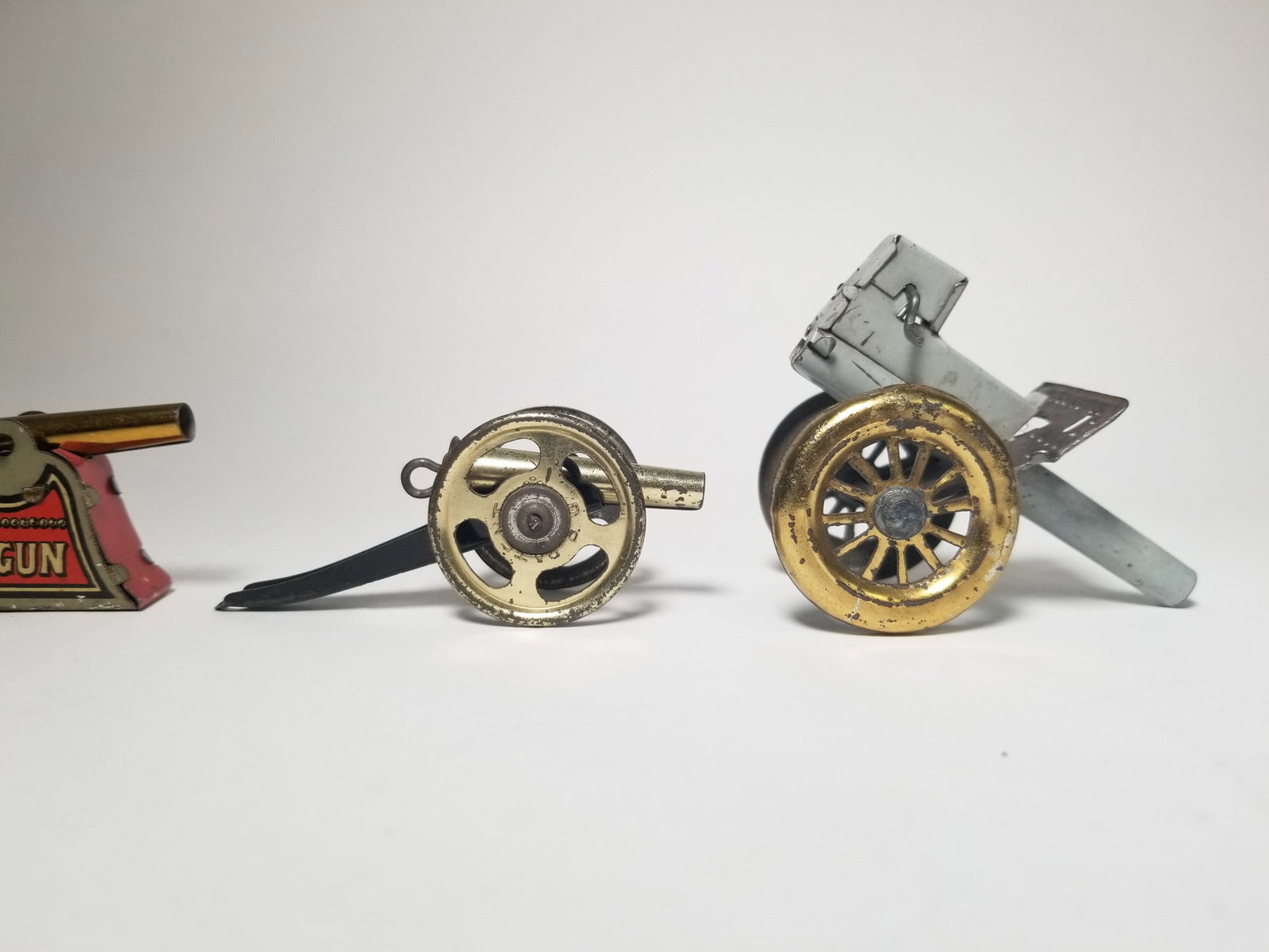 Grouping of Vintage Tin Litho Toy Cannons - 2