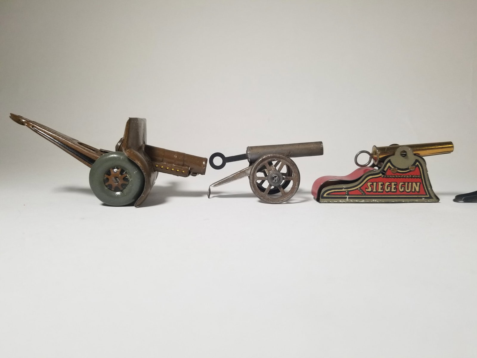 Grouping of Vintage Tin Litho Toy Cannons - 3