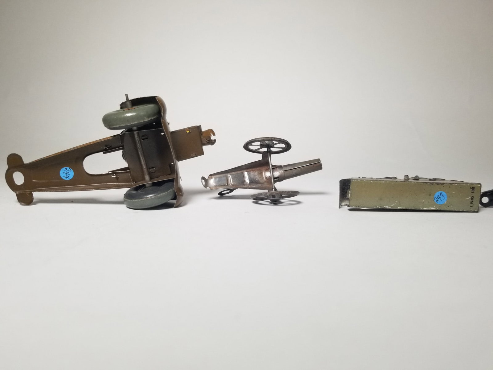 Grouping of Vintage Tin Litho Toy Cannons - 5