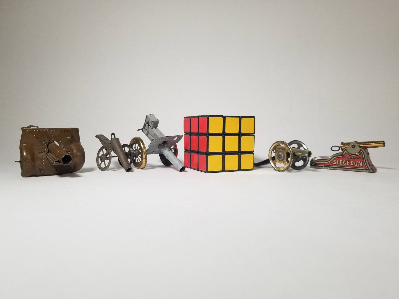 Grouping of Vintage Tin Litho Toy Cannons - 6