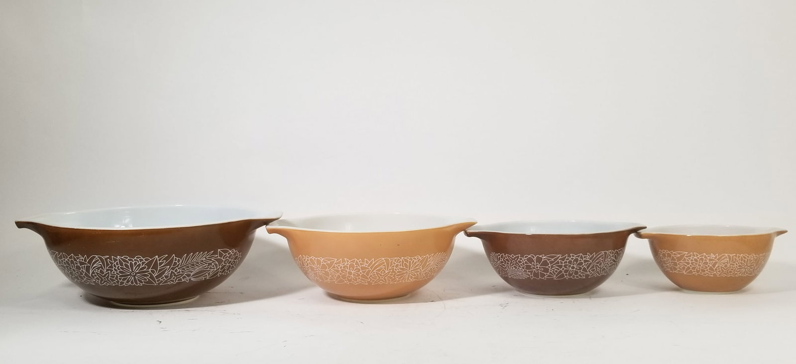 Vintage Pyrex Woodland Cinderella Bowl Set of Four: Vintage Pyrex Woodland Cinderella Bowl Set of Four Size 13" x 10.5" x 4.5" Literature Brooks Auction – Online Auction Terms & Conditions Contact: (856) 694-2960 | info@brooks.auction READ