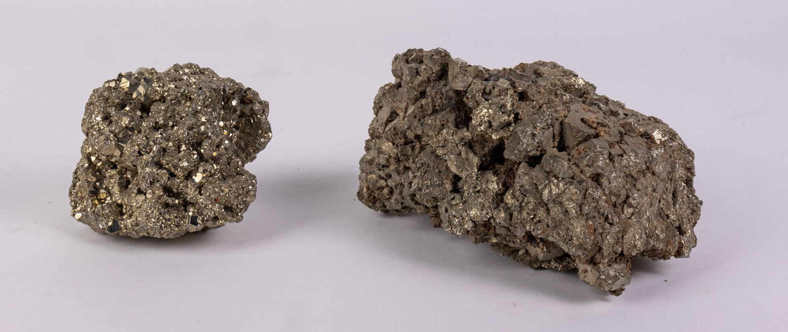 Two Large Pieces of Pyrite: Two Large Pieces of Pyrite Size 6" (largest) Literature Brooks Auction – Online Auction Terms & Conditions Contact: (856) 694-2960 | info@brooks.auction READ BEFORE YOU BID: We want you