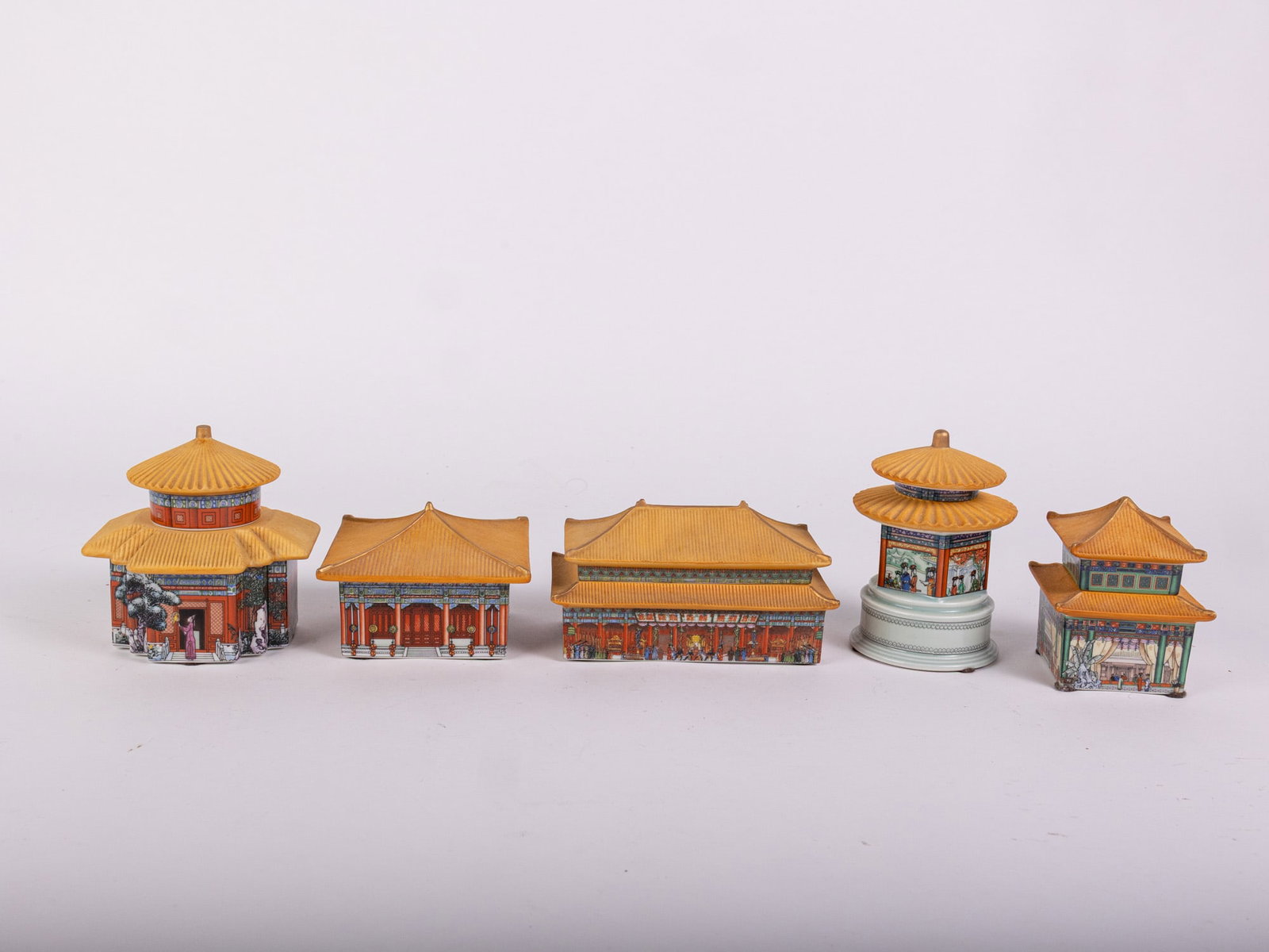 Grouping of Asian Porcelain Trinket Music Boxes of The Forbidden City by the Palace Museum: Grouping of Asian Porcelain Trinket Music Boxes of The Forbidden City by the Palace Museum Size 7" x 12" x 12" Literature Brooks Auction – Online Auction Terms & Conditions Contact: (856)