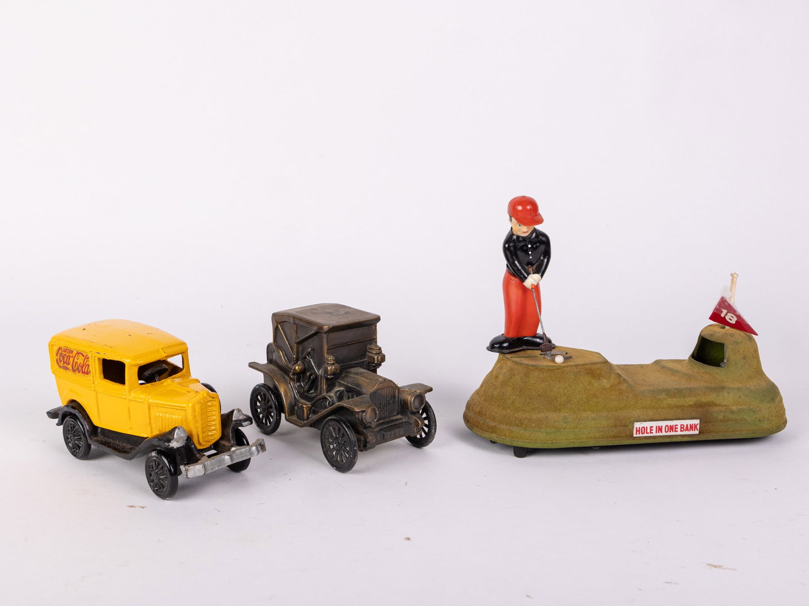 Three Vintage Coin Banks (1 of 4)