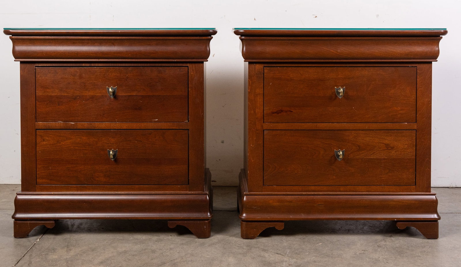 Pair of Contemporary 2-Drawer Cherry Finish Nightstands: Pair of Contemporary 2-Drawer Cherry Finish Nightstands Size 29" x 28" x 15" Literature Brooks Auction – Online Auction Terms & Conditions Contact: (856) 694-2960 | info@brooks.auction READ