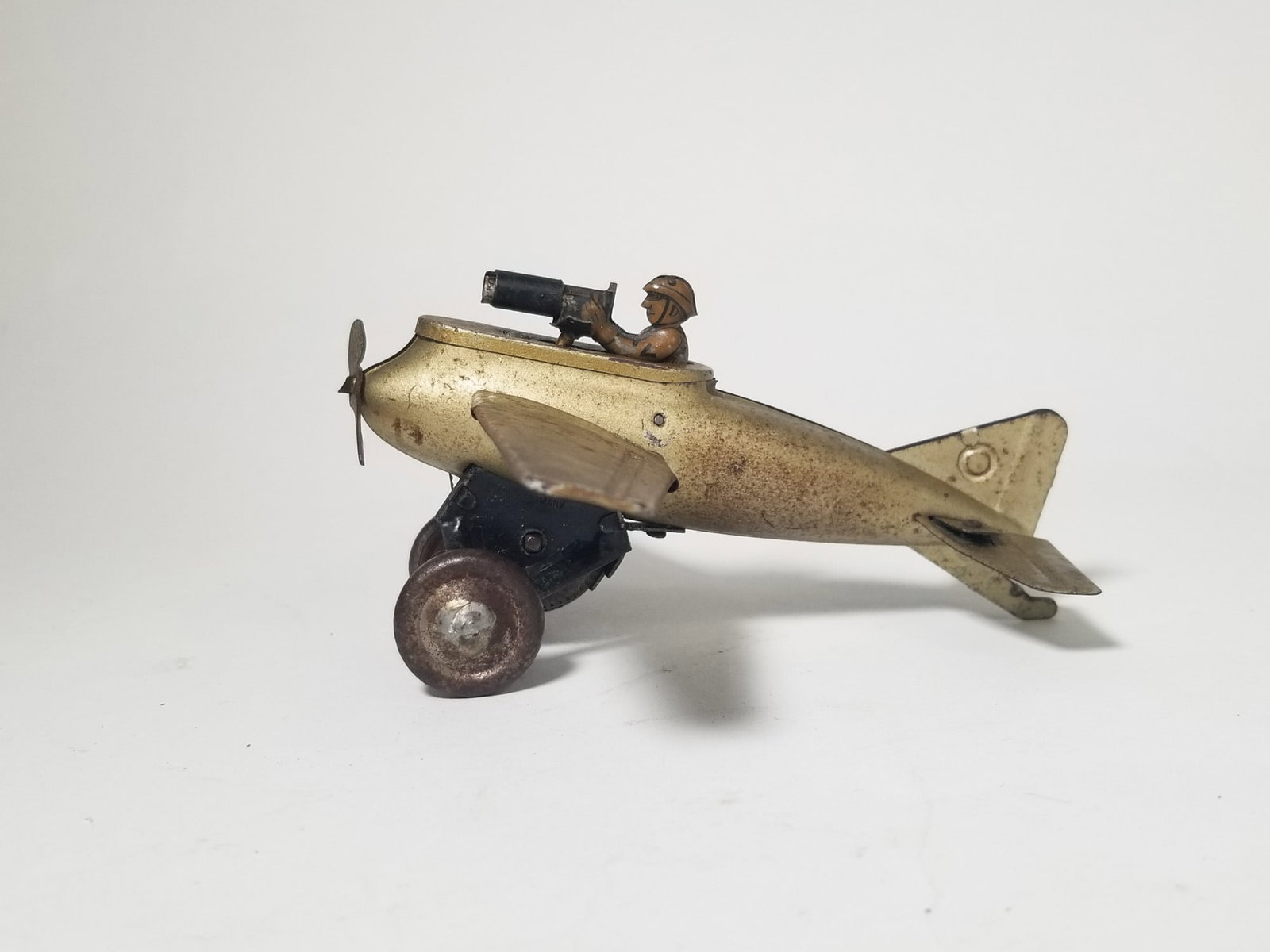 Early 20th Century Tin Litho Wind Up Toy Airplane: Early 20th Century Tin Litho Wind Up Toy Airplane Size 4" H Literature Brooks Auction – Online Auction Terms & Conditions Contact: (856) 694-2960 | info@brooks.auction READ BEFORE YOU BID:</
