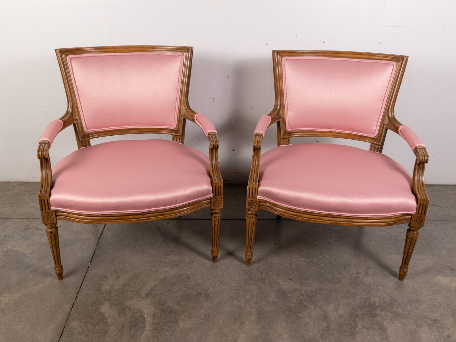 Pair of Vintage Pastel Pink Chairs: Pair of Vintage Pastel Pink Chairs Size 30" x 25" x 18" Literature Brooks Auction – Online Auction Terms & Conditions Contact: (856) 694-2960 | info@brooks.auction READ BEFORE YOU BID: We want
