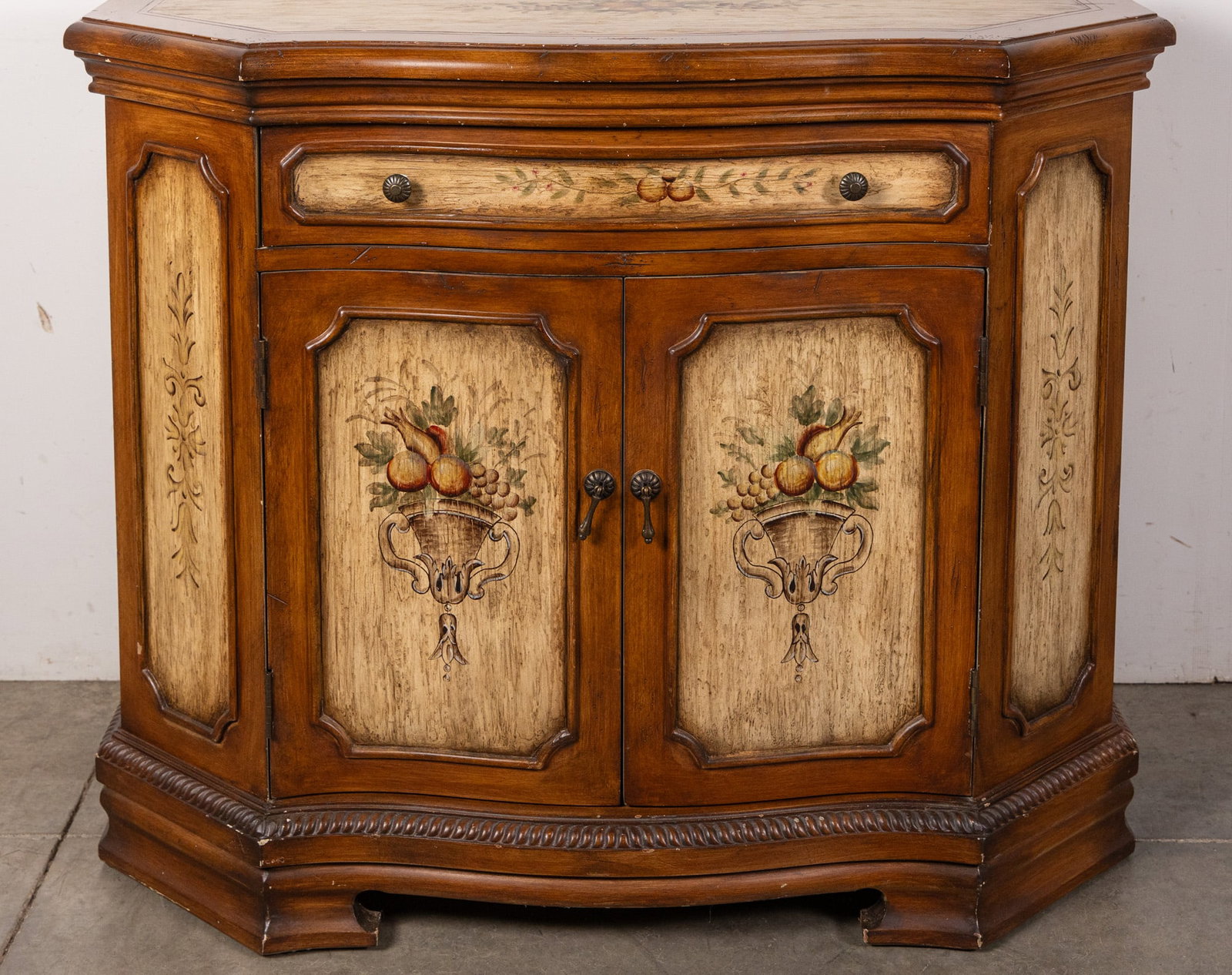 Serpentine 2-Door Cabinet w/ Hand Painted Floral Motif: Serpentine 2-Door Cabinet w/ Hand Painted Floral Motif Size 35" x 42" x 19" Literature Brooks Auction – Online Auction Terms & Conditions Contact: (856) 694-2960 | info@brooks.auction READ