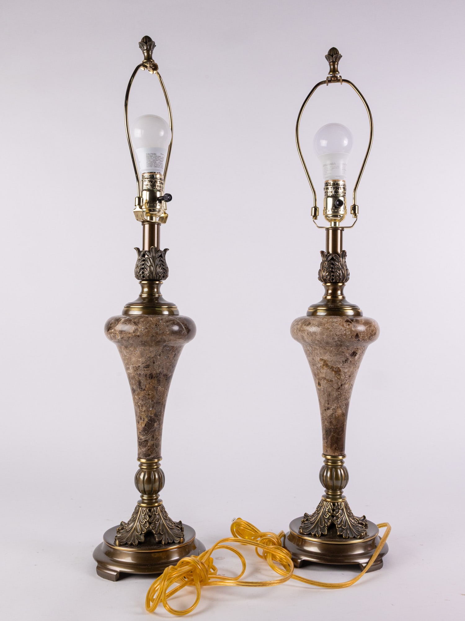 Pair of Neoclassical Style Stone Table Lamps: Pair of Neoclassical Style Stone Table Lamps Literature Brooks Auction – Online Auction Terms & Conditions Contact: (856) 694-2960 | info@brooks.auction READ BEFORE YOU BID: We want you to feel 