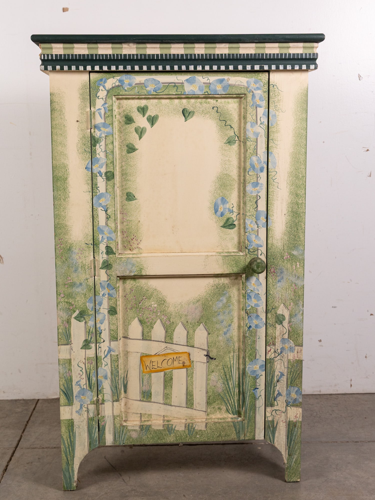 Vintage Folk Art Hand Painted 1-Door Cabinet: Vintage Folk Art Hand Painted 1-Door Cabinet Size 40" x 25" x 12" Literature Brooks Auction – Online Auction Terms & Conditions Contact: (856) 694-2960 | info@brooks.auction READ BEFORE YOU