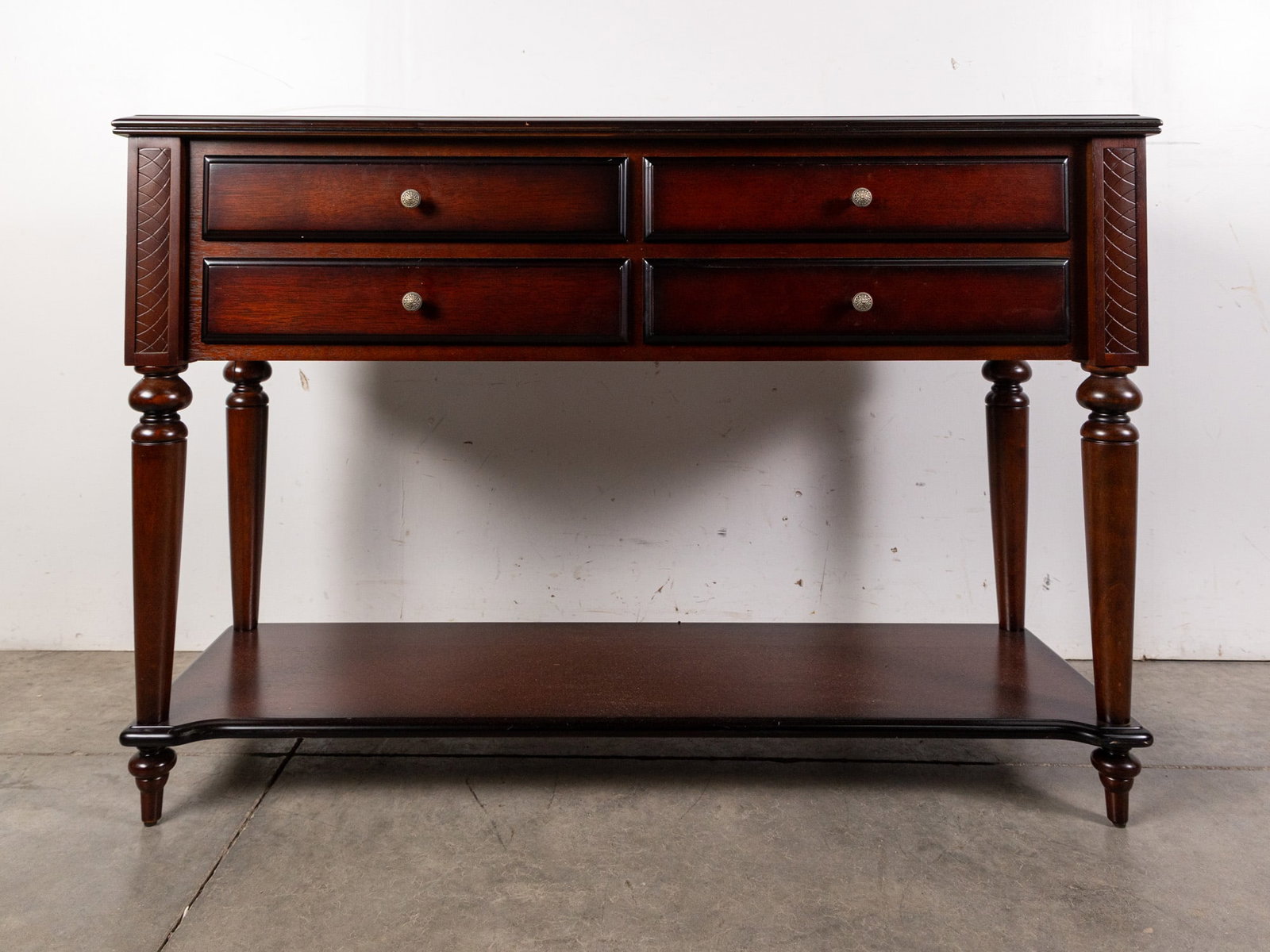 Contemporary 4-Drawer Console Table: Contemporary 4-Drawer Console Table Size 33" x 48" x 16" Literature Brooks Auction – Online Auction Terms & Conditions Contact: (856) 694-2960 | info@brooks.auction READ BEFORE YOU BID: We want