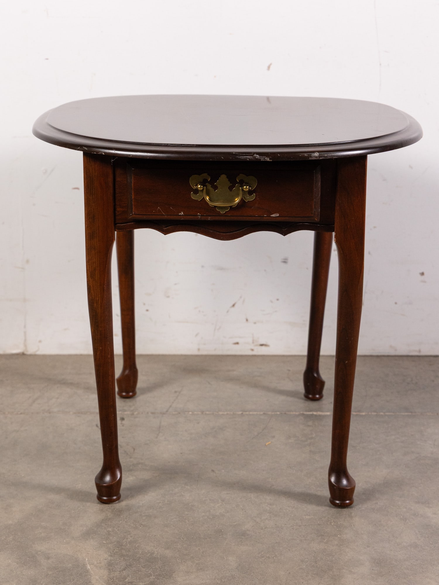 Contemporary Queen Anne Style End Table: Contemporary Queen Anne Style End Table Size 22" x 24" x 27" Literature Brooks Auction – Online Auction Terms & Conditions Contact: (856) 694-2960 | info@brooks.auction READ BEFORE YOU BID: We