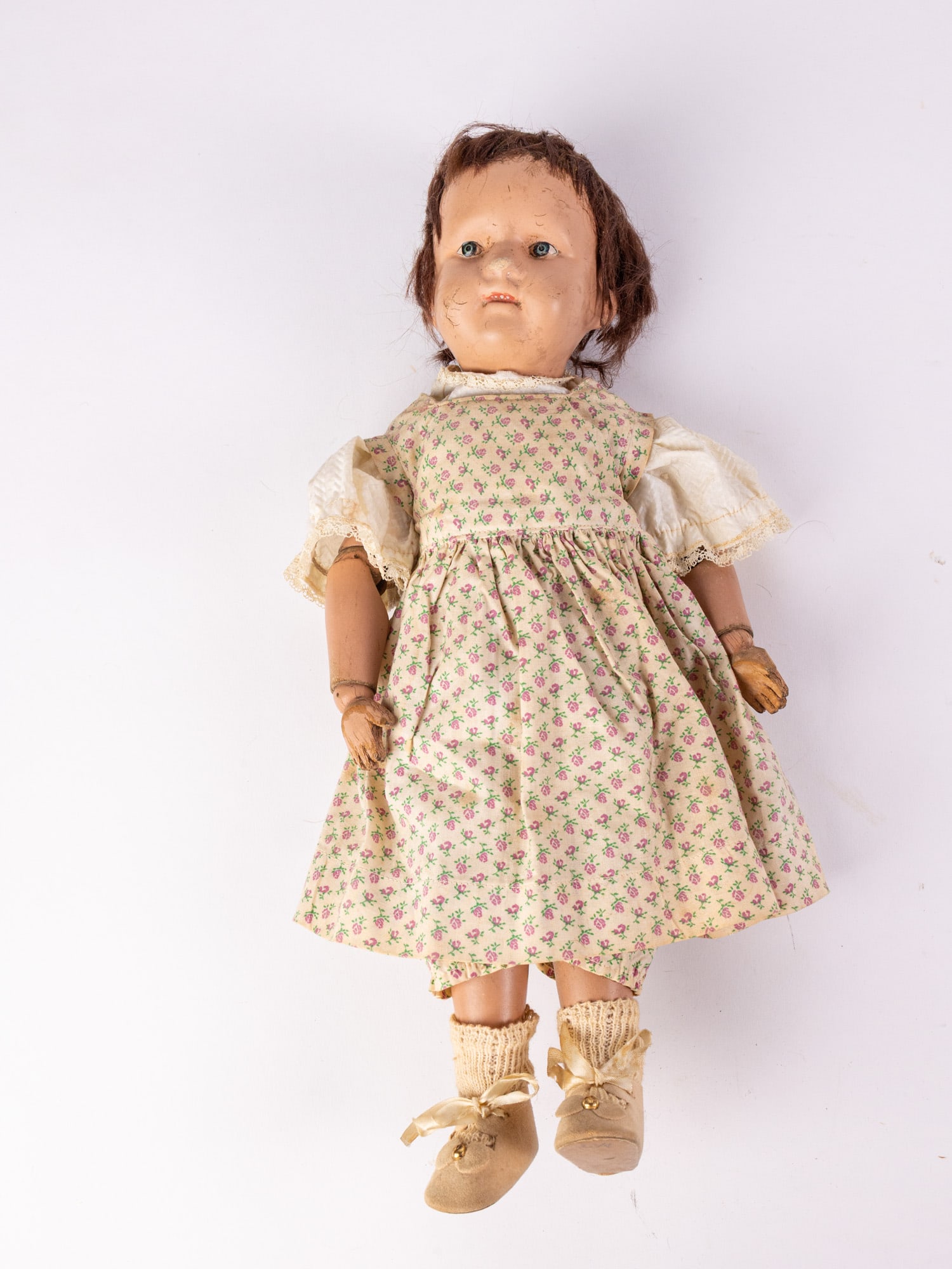 Antique Schoenhut 15" Girl Doll: Composite head, wooden arms and legs, Schoenhut mark on back of neck. Size 15" Literature Brooks Auction – Online Auction Terms & Conditions Contact: (856) 694-2960 | info@brooks.auction READ