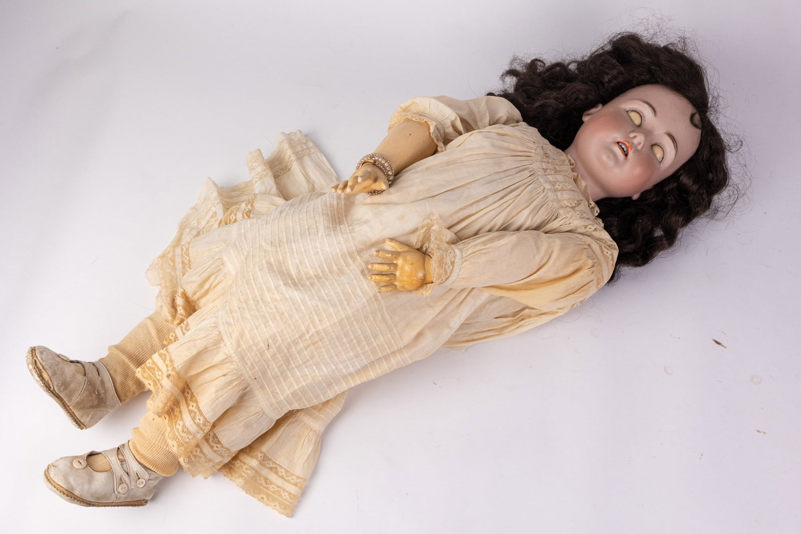 Antique 33" German Bisque Doll: Bisque head, composite arms, legs, and body. Marked "Made in Germany 171" on back of neck. Size 32" Literature Brooks Auction – Online Auction Terms & Conditions Contact: (856) 694-2960 |
