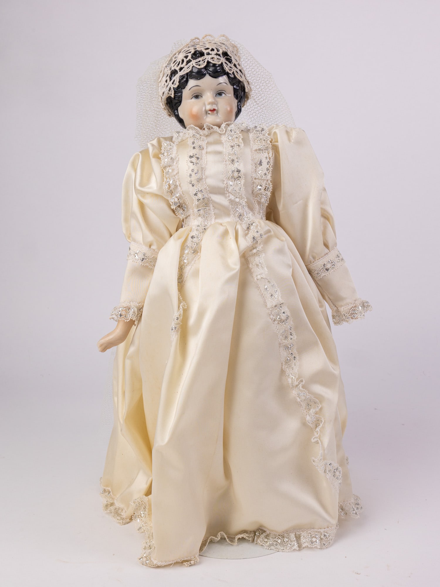 China Head Porcelain Bride Doll: Porcelain head with "5" stamped in back of neck, porcelain hands and feet, cloth body. Size 18" Literature Brooks Auction – Online Auction Terms & Conditions Contact: (856) 694-2960 |