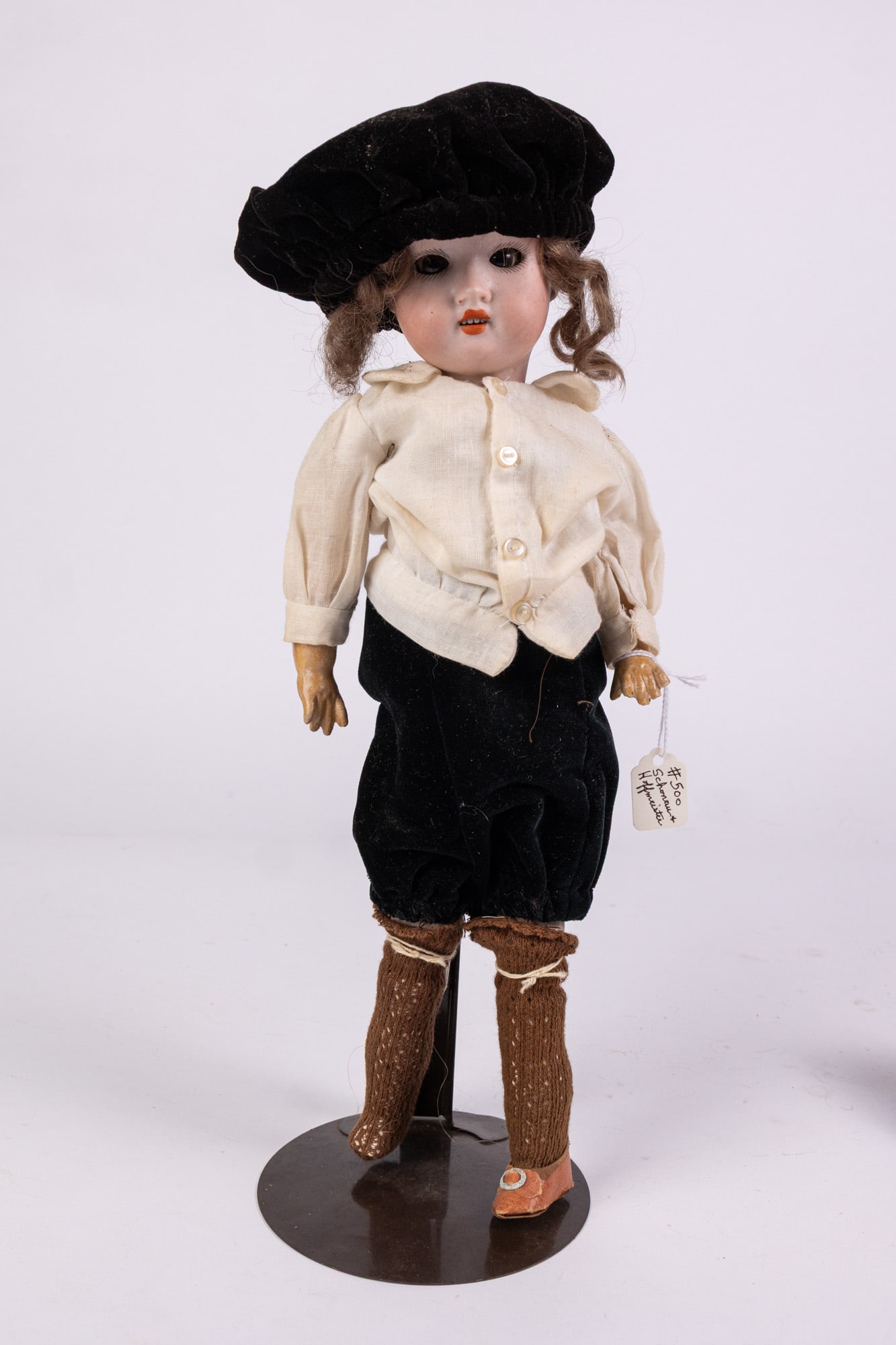 Schoenau & Hoffmeister Bisque Doll: Bisque head, composite ball-jointed body. Size 14" H Literature Brooks Auction – Online Auction Terms & Conditions Contact: (856) 694-2960 | info@brooks.auction READ BEFORE YOU BID: We want you