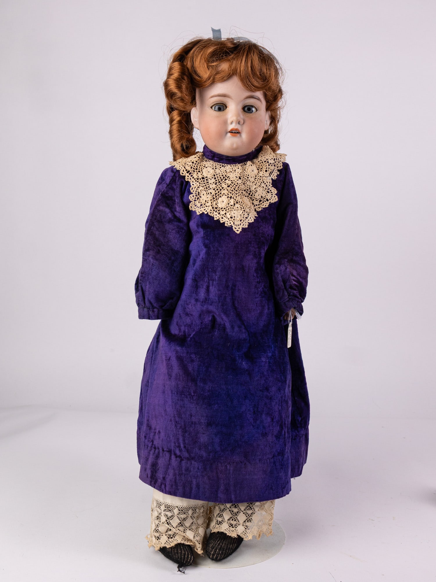 Armand Marseille Antique Bisque 20" Doll: Bisque head and hands, leather body. Marked AM 370 on back of neck. Size 20" Literature Brooks Auction – Online Auction Terms & Conditions Contact: (856) 694-2960 | info@brooks.auction READ