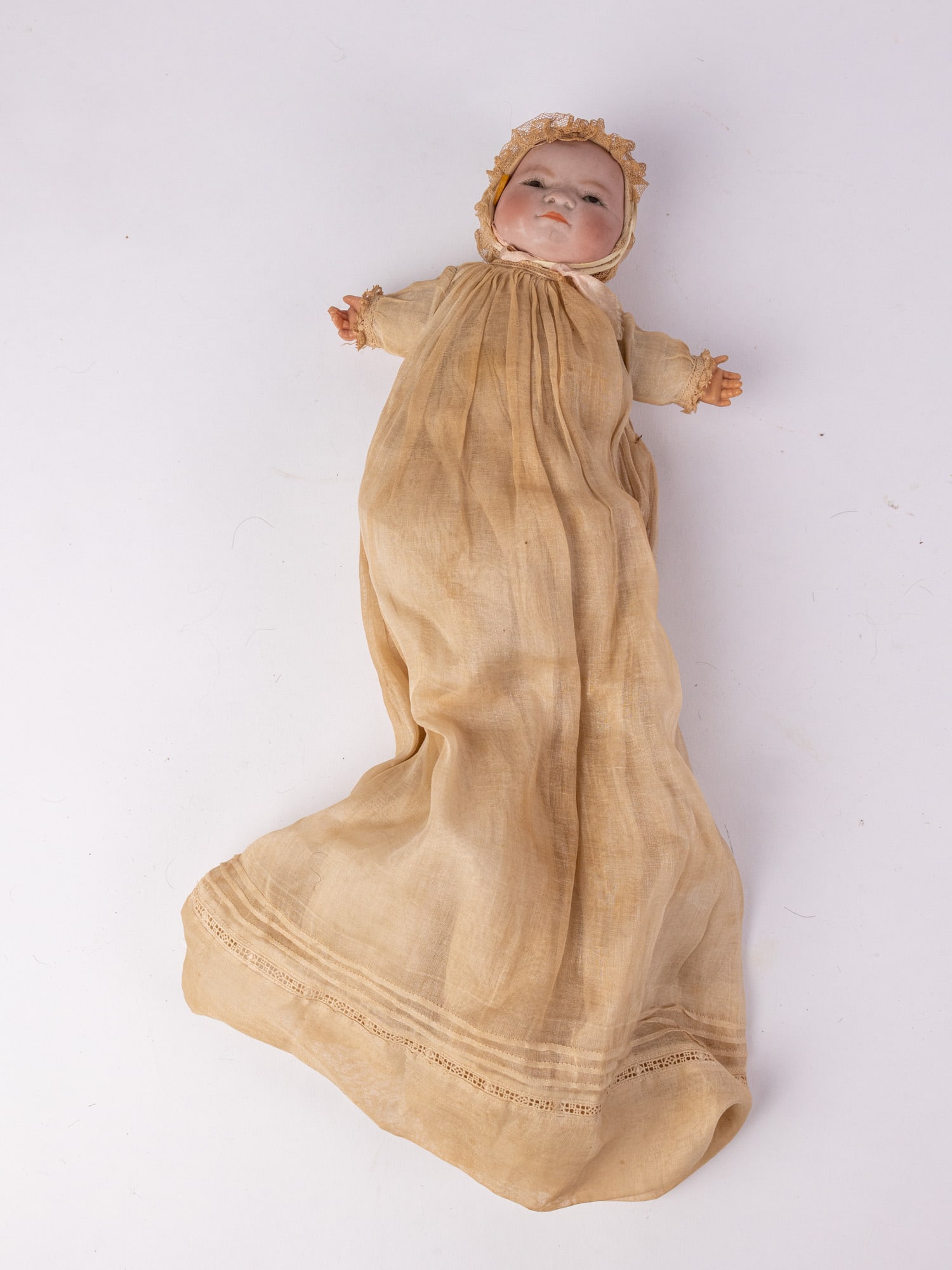 Antique Grace S. Putnam "Bye-Lo Baby" Bisque Doll: Bisque head, celluloid hands, stuffed cloth body, brown glass eyes, painted lashes. Size 18" H Literature Brooks Auction – Online Auction Terms & Conditions Contact: (856) 694-2960 |