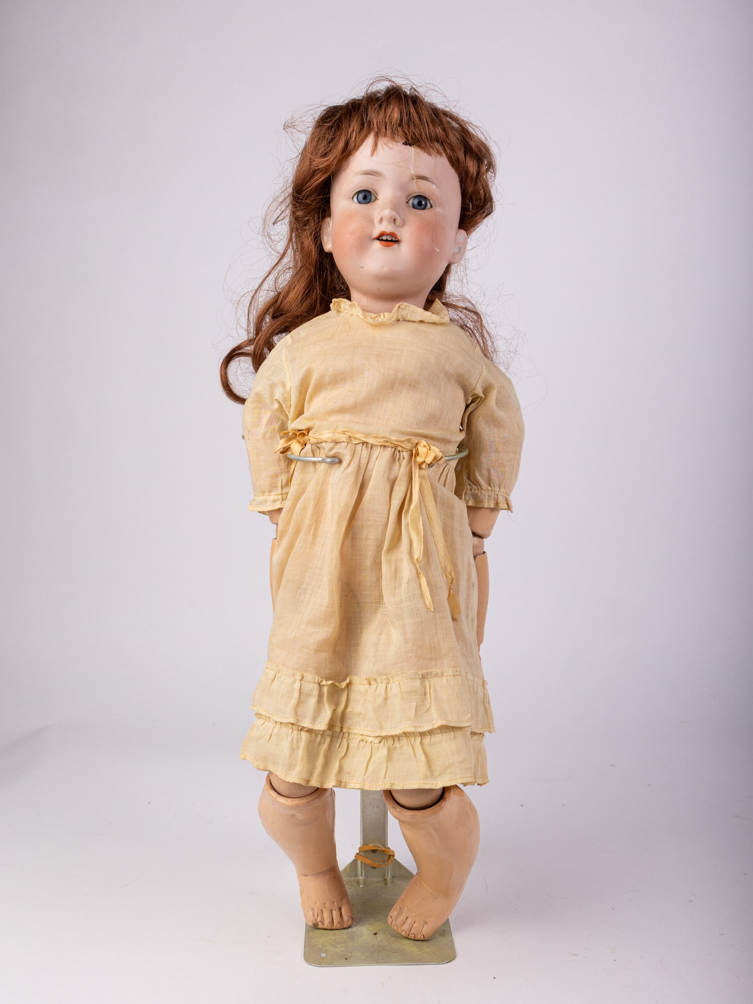 Armand Marseille Bisque Doll: Bisque head, composite arms, legs, and body. Marked Armand Marseille Germany 390 A8 on back of neck. Size 23" Literature Brooks Auction – Online Auction Terms & Conditions Contact: (856) 694-29