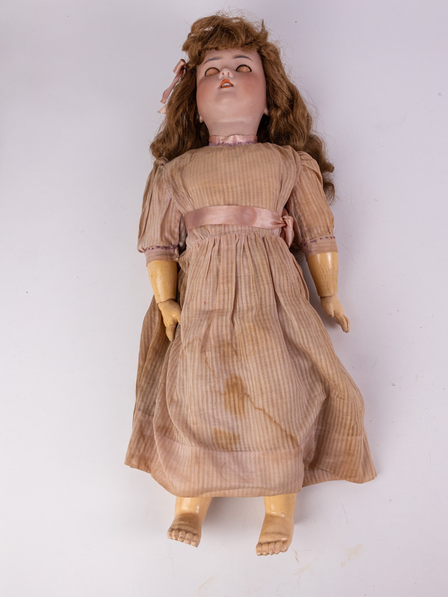 Antique C. M. Bergmann Simon & Halbig 22" Bisque Doll: Bisque head, composition arms, legs, and body. Marked C. M. Bergmann Simon & Halbig on back of neck. Size 23" Literature Brooks Auction – Online Auction Terms & Conditions Contact: (856) 694-29