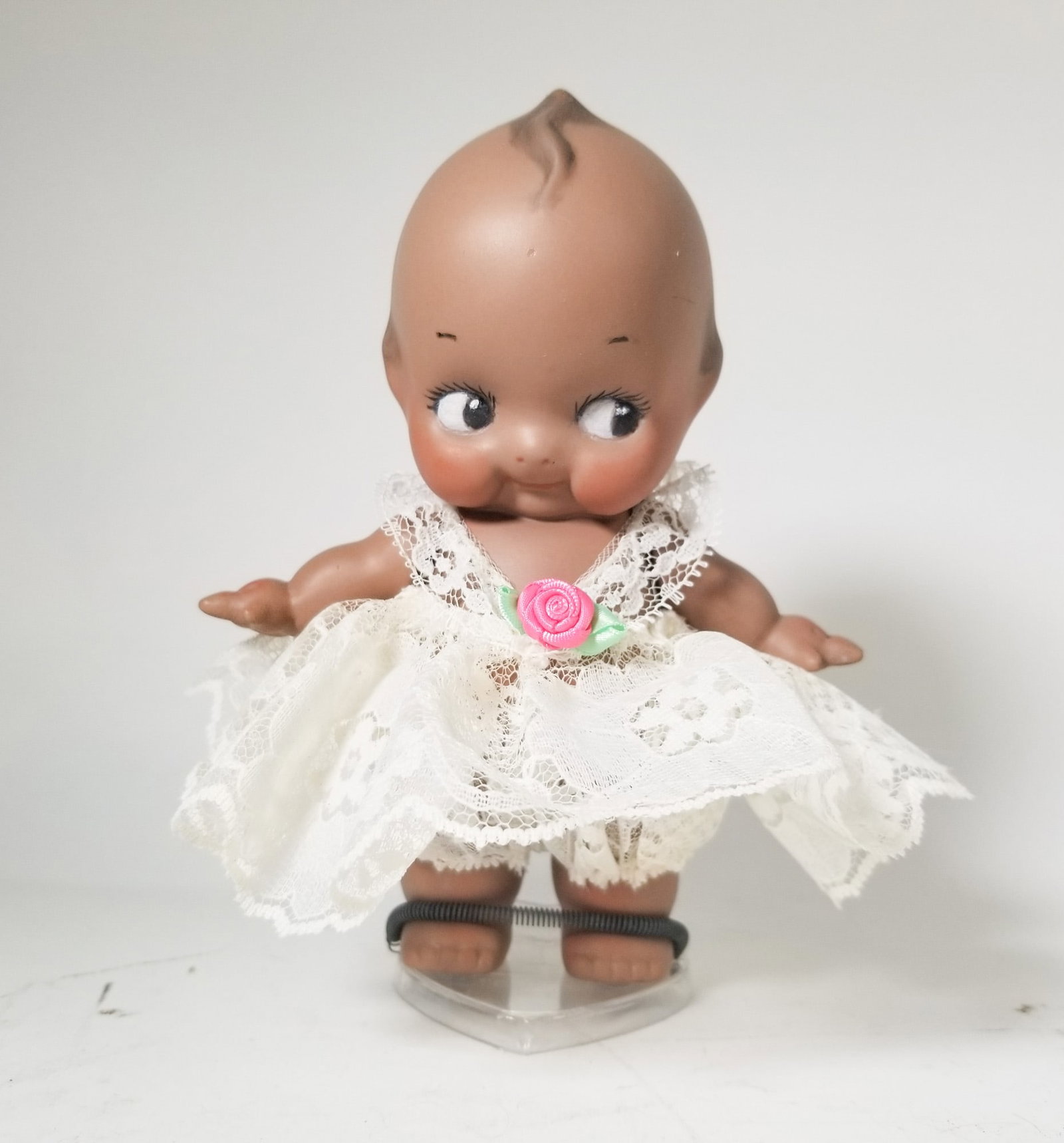 7" Porcelain Vintage Kewpie Doll: 7" Porcelain Vintage Kewpie Doll Size 7" Literature Brooks Auction – Online Auction Terms & Conditions Contact: (856) 694-2960 | info@brooks.auction READ BEFORE YOU BID: We want you to feel