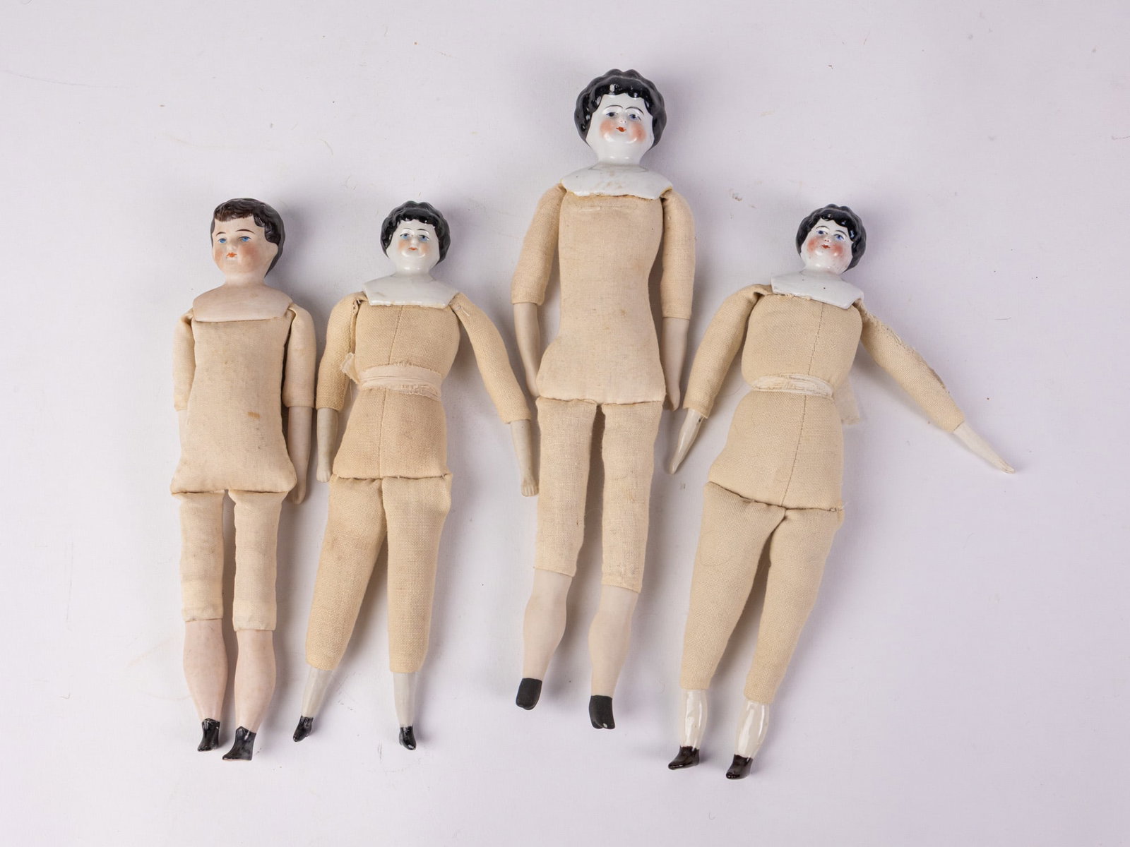 (4) Antique China Head Dolls: (4) Antique China Head Dolls Size 10.5" H Literature Brooks Auction – Online Auction Terms & Conditions Contact: (856) 694-2960 | info@brooks.auction READ BEFORE YOU BID: We want you to