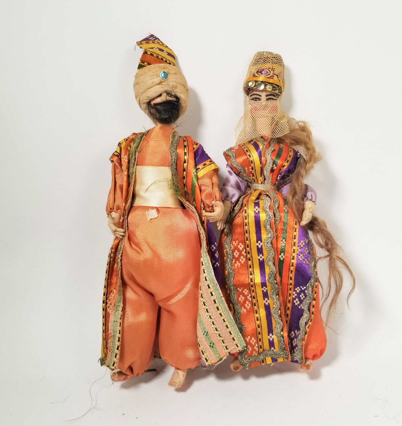 Pair of Vintage Turkish Traditional Male & Female Dolls: Pair of Vintage Turkish Traditional Male & Female Dolls Size 10" H Literature Brooks Auction – Online Auction Terms & Conditions Contact: (856) 694-2960 | info@brooks.auction READ BEFORE YOU