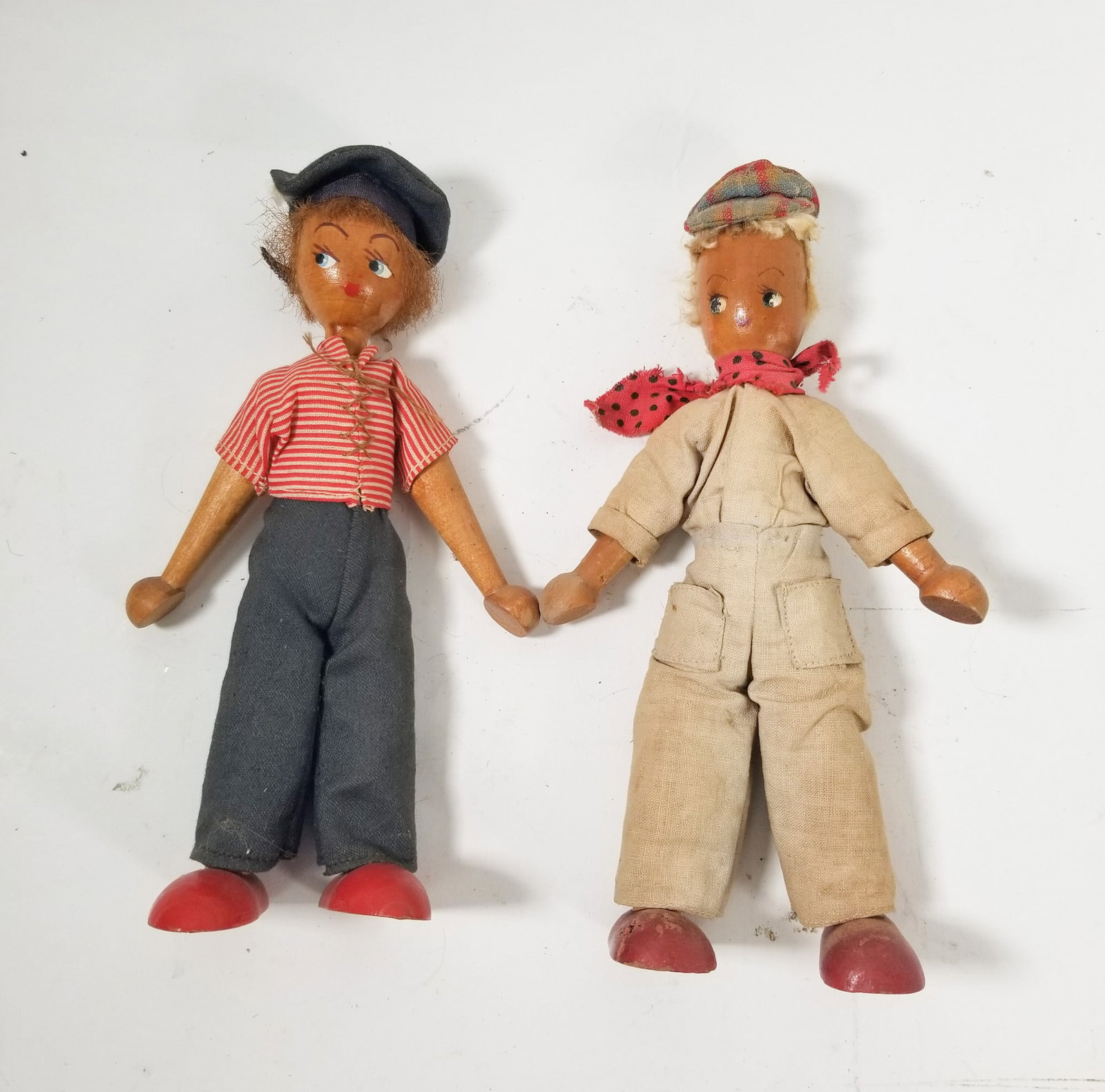 Pair of Vintage Polish Jointed Wood Peg Doll: Pair of Vintage Polish Jointed Wood Peg Doll Size 8" H Literature Brooks Auction – Online Auction Terms & Conditions Contact: (856) 694-2960 | info@brooks.auction READ BEFORE YOU BID: We want
