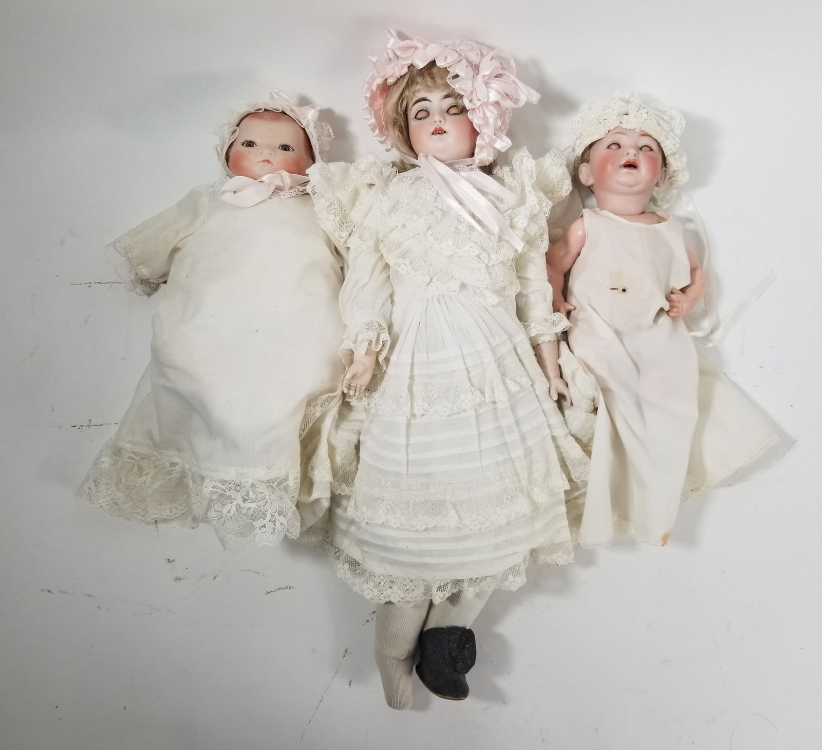 Assorted Vintage Bisque Dolls: Assorted Vintage Bisque Dolls Size 7" x 12" x 12" Literature Brooks Auction – Online Auction Terms & Conditions Contact: (856) 694-2960 | info@brooks.auction READ BEFORE YOU BID: We want you to