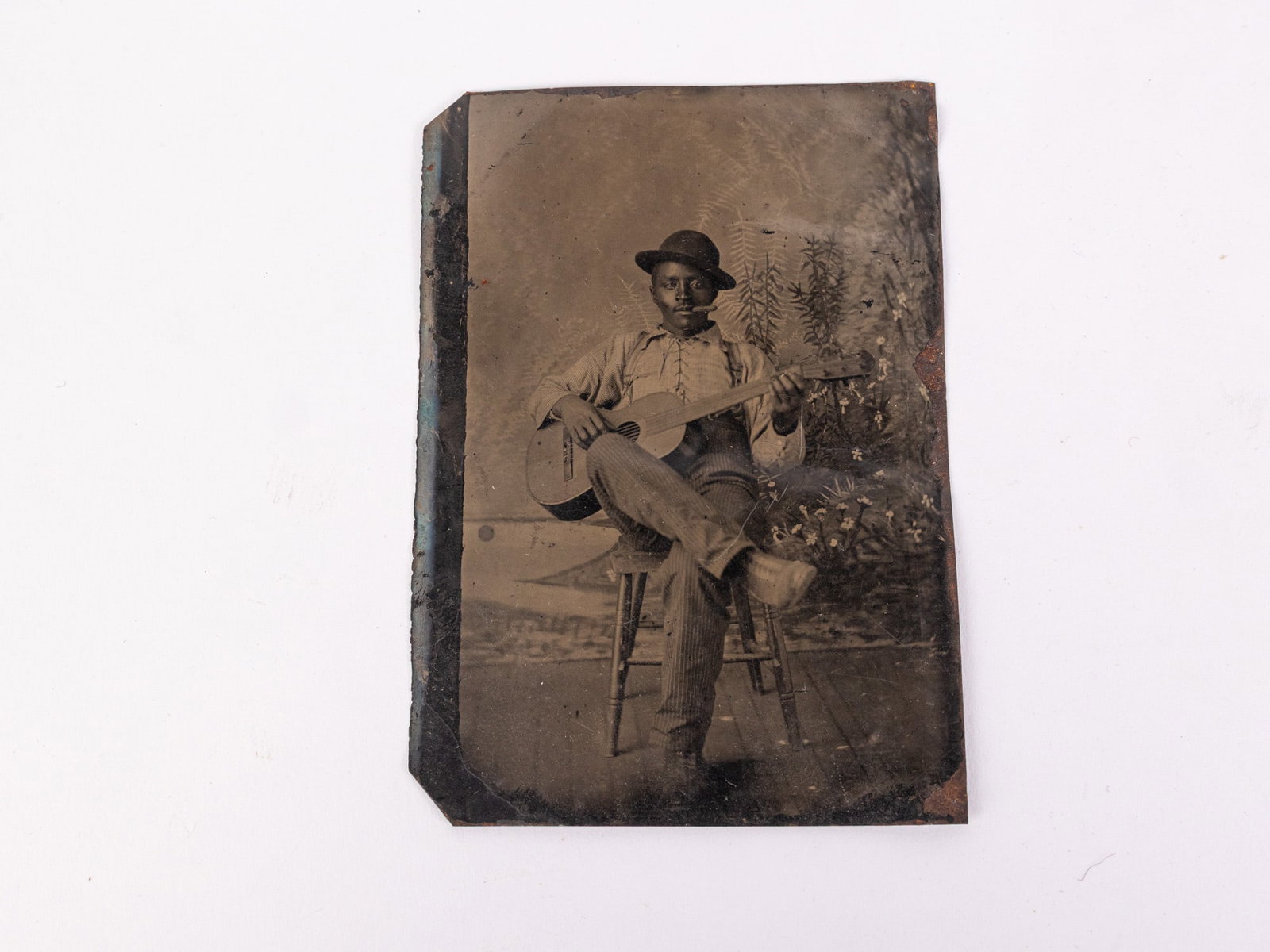 Antique Early Tintype of Black Musician: Antique Early Tintype of Black Musician Size 3.5" x 2.5" Literature Brooks Auction – Online Auction Terms & Conditions Contact: (856) 694-2960 | info@brooks.auction READ BEFORE YOU BID: We want