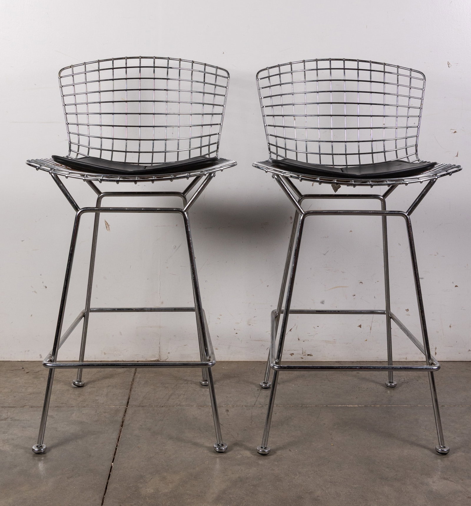 (2) Harry Bertoia for Knoll Bar Stools: (2) Harry Bertoia for Knoll Bar Stools Size 39" x 21" x 19" Literature Brooks Auction – Online Auction Terms & Conditions Contact: (856) 694-2960 | info@brooks.auction READ BEFORE YOU BID: We