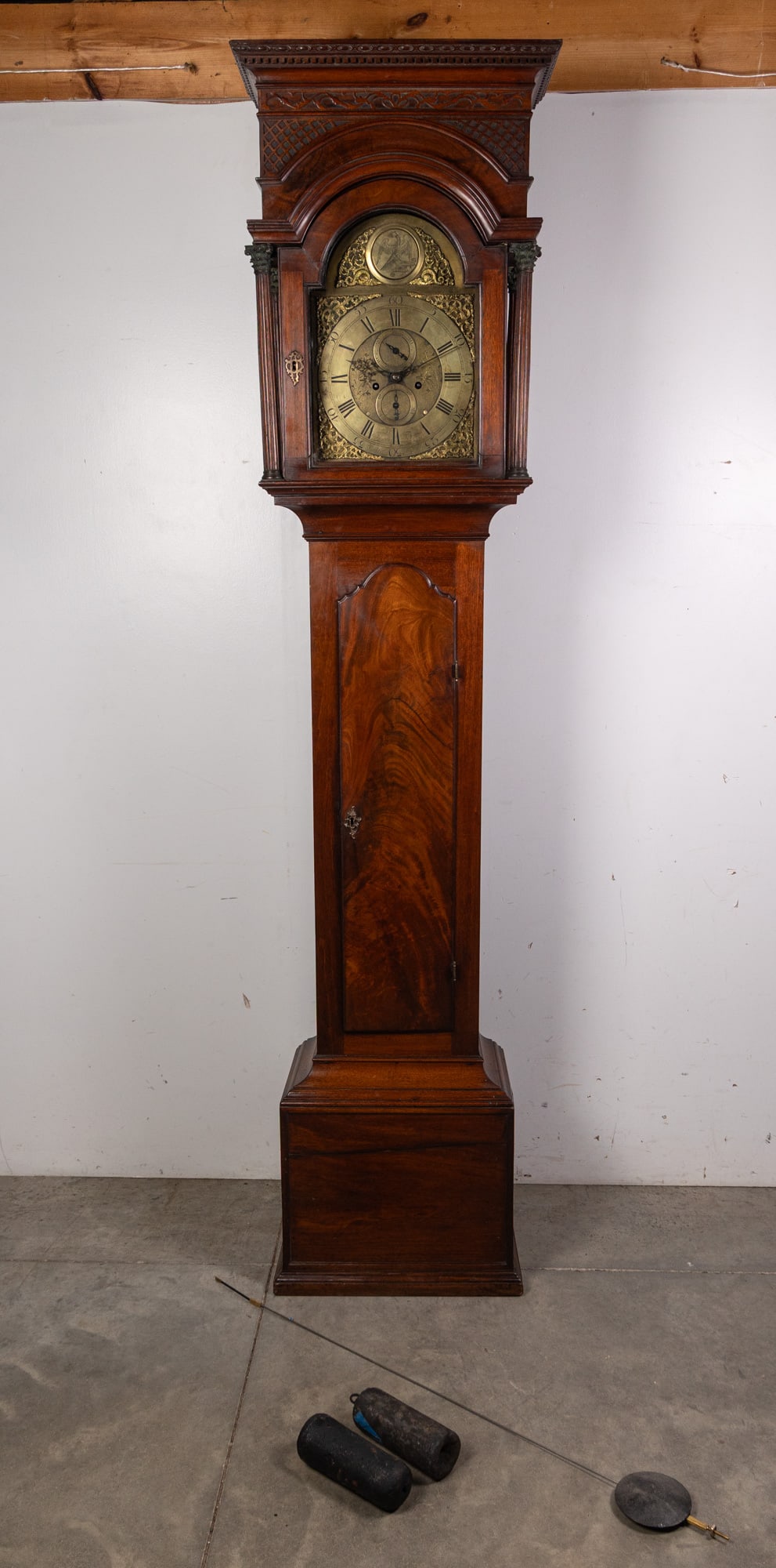 Thomas Davies, Monmouth, New Jersey Late 18th Century Tall Case Clock: Little is known about Thomas Davies, the maker of this clock, besides the fact that he operated in Monmouth, New Jersey, in the 18th and possibly 19th centuries. Despite the lack of information on the