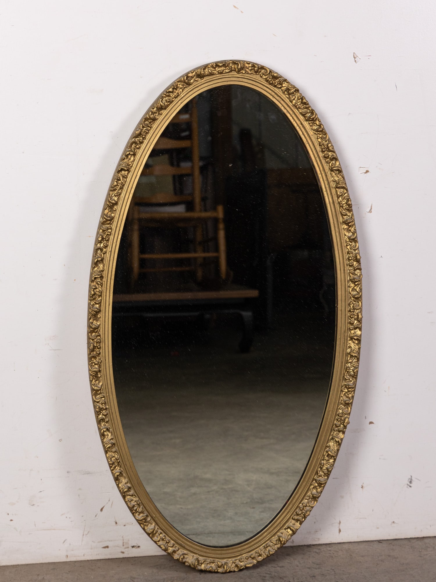 Ornate Gold Toned Wall Mounted Oval Mirror: Ornate Gold Toned Wall Mounted Oval Mirror Size 40" x 21" Literature Brooks Auction – Online Auction Terms & Conditions Contact: (856) 694-2960 | info@brooks.auction READ BEFORE YOU BID: