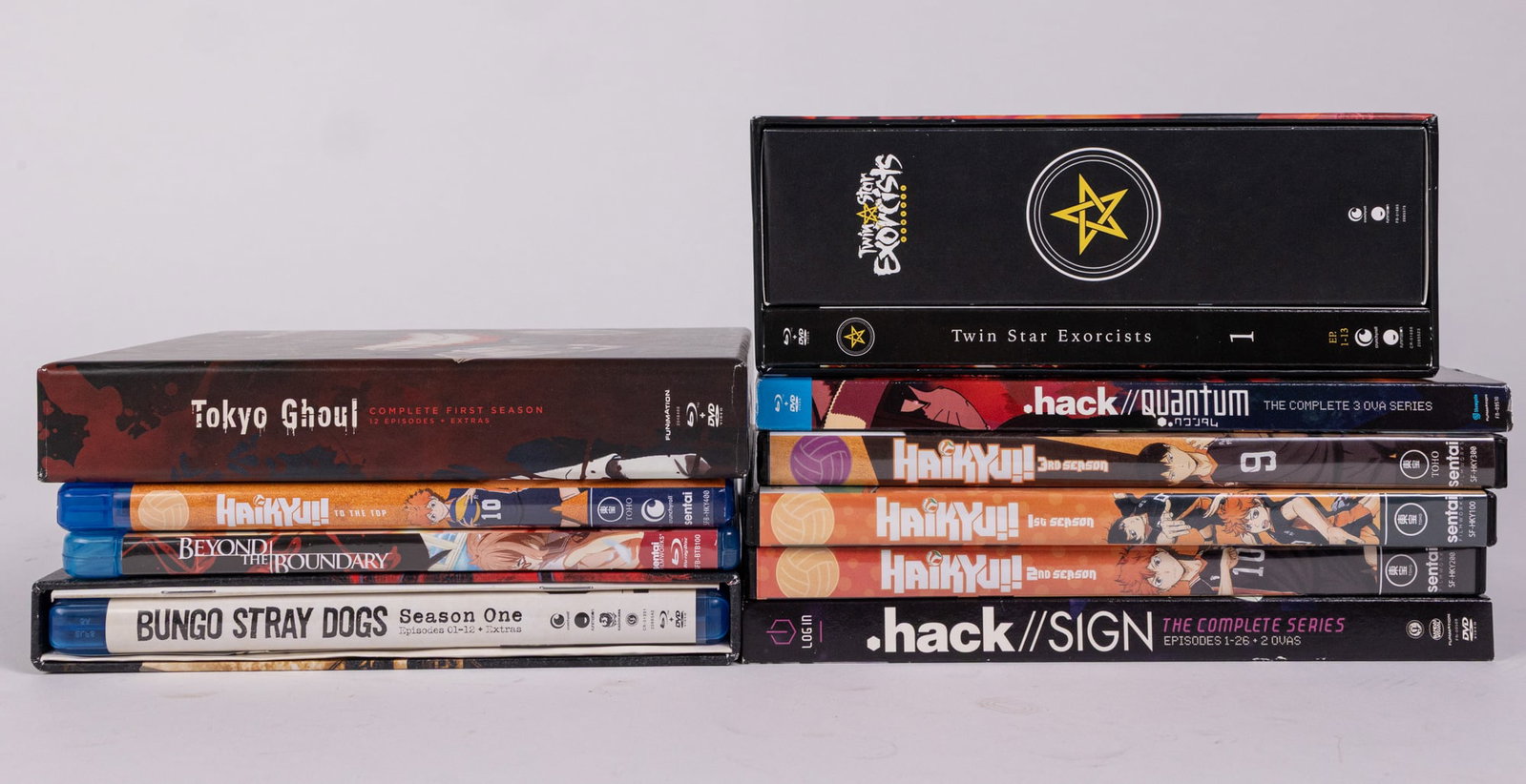 Assortment of Anime DVDs: Haikyuu - Tokyo Ghoul - Bungo Stray Dogs - and more Size 7" x 12" x 12" Literature Brooks Auction – Online Auction Terms & Conditions Contact: (856) 694-2960 | info@brooks.auction READ BEFORE