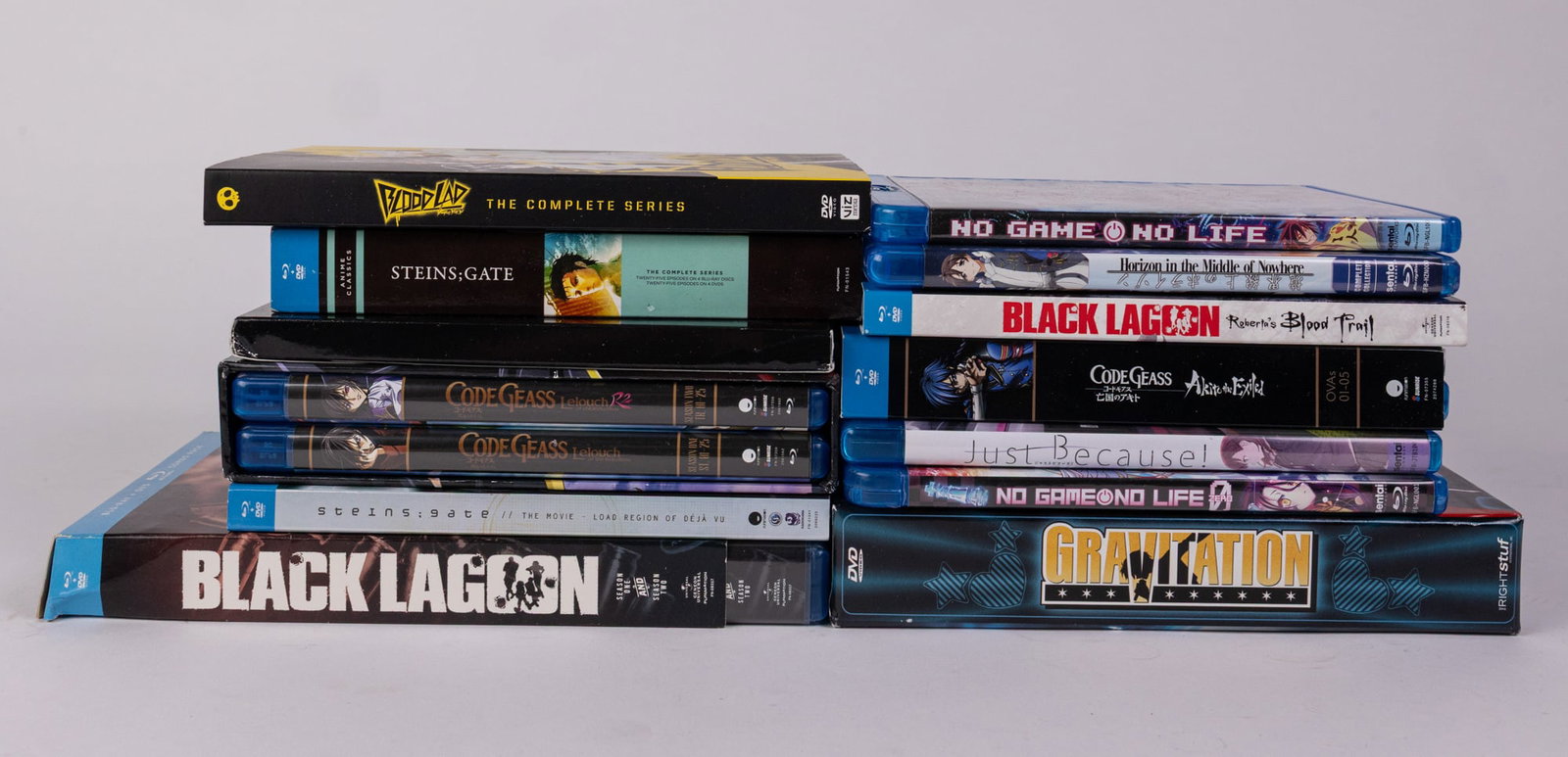 Assortment of Anime DVDs: Code Cases - Black Lagoon - No Game No Life - and more Size 7" x 12" x 12" Literature Brooks Auction – Online Auction Terms & Conditions Contact: (856) 694-2960 | info@brooks.auction READ