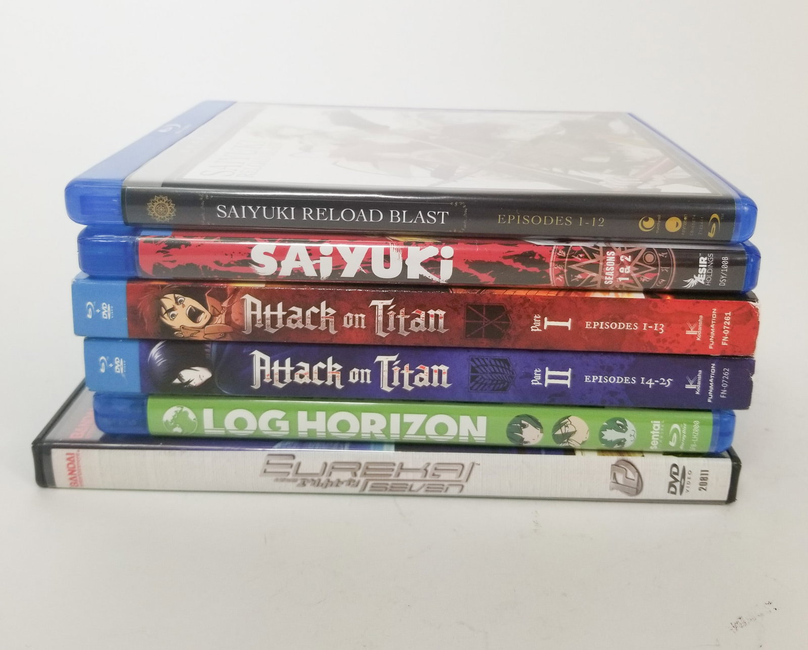 Assortment of Anime DVDs: Attack on Titan - Saiyuki - and more Size 7" x 12" x 12" Literature Brooks Auction – Online Auction Terms & Conditions Contact: (856) 694-2960 | info@brooks.auction READ BEFORE YOU BID: We want