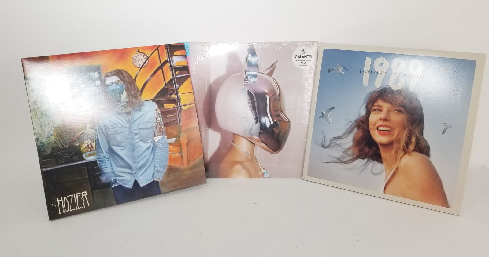 Assorted Pop Vinyls: Hozier - Taylor Swift - Galantis Size 12" x 12" Literature Brooks Auction – Online Auction Terms & Conditions Contact: (856) 694-2960 | info@brooks.auction READ BEFORE YOU BID: We want you to