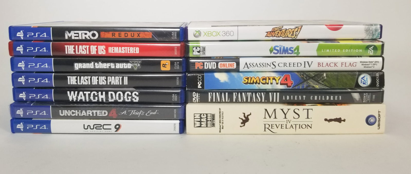 Assortment of Video Games: The Last of Us Part II - Myst IV: Revelation - Grand Theft Auto V - and more Size 7" x 12" x 12" Literature Brooks Auction – Online Auction Terms & Conditions Contact: (856) 694-2960 | info@bro