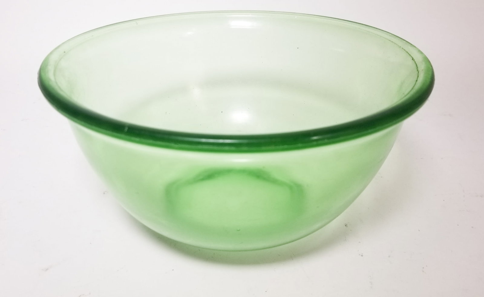 Vintage Uranium Glass Mixing Bowl: Vintage Uranium Glass Mixing Bowl Size 5" x 9" diameter Literature Brooks Auction – Online Auction Terms & Conditions Contact: (856) 694-2960 | info@brooks.auction READ BEFORE YOU BID: We want