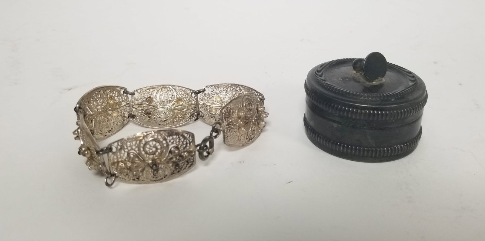 Silver Plated Trinket Box and Bracelet: Silver Plated Trinket Box and Bracelet Literature Brooks Auction – Online Auction Terms & Conditions Contact: (856) 694-2960 | info@brooks.auction READ BEFORE YOU BID: We want you to feel confid