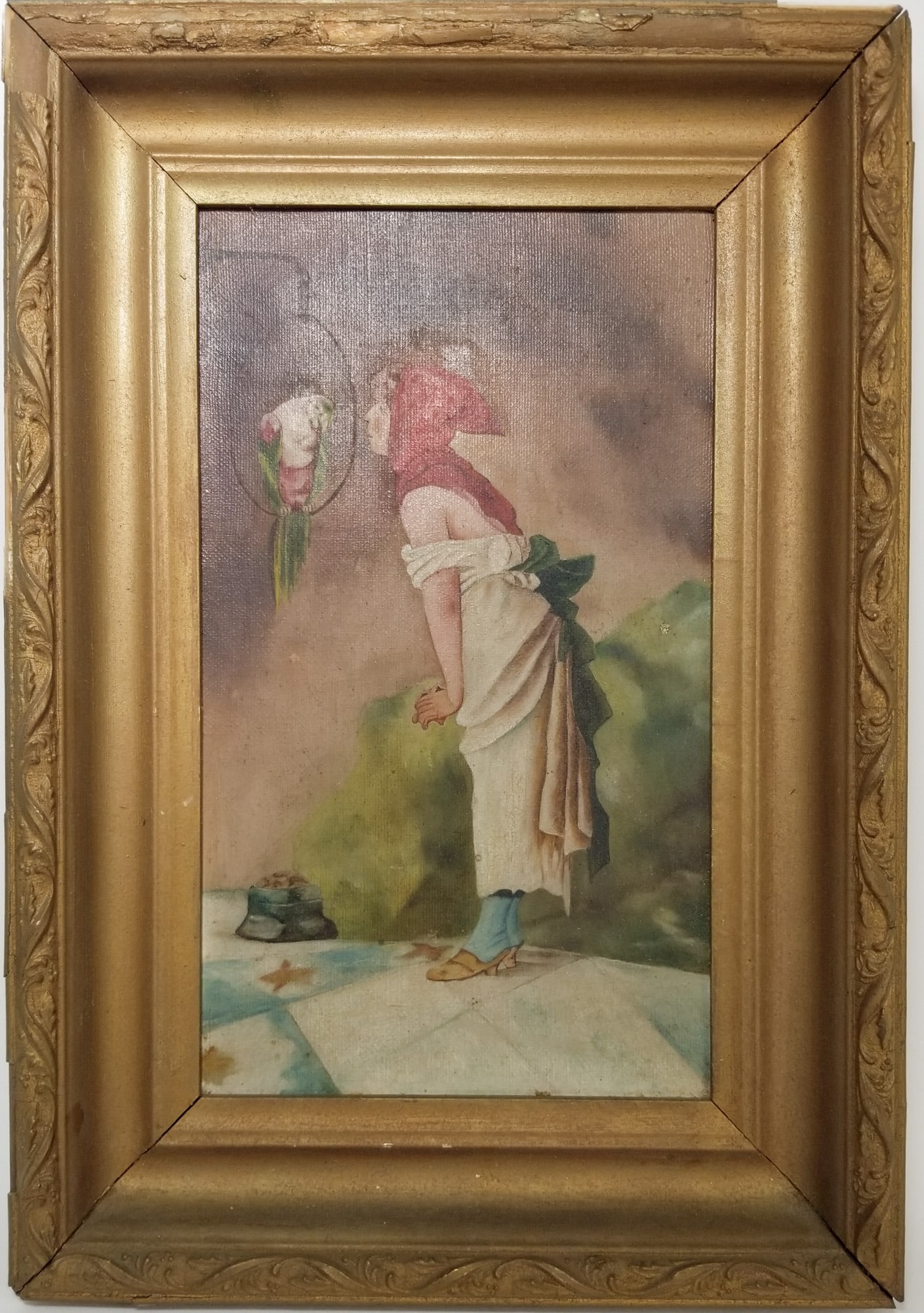 Young Girl with Parrot Framed Original Artwork on Canvas: Original oil painting on canvas depicting a young girl in a red hood curiously inspecting a parrot perched on a hanging stand. Likely early 20th century based on signs of aging as well as the attire