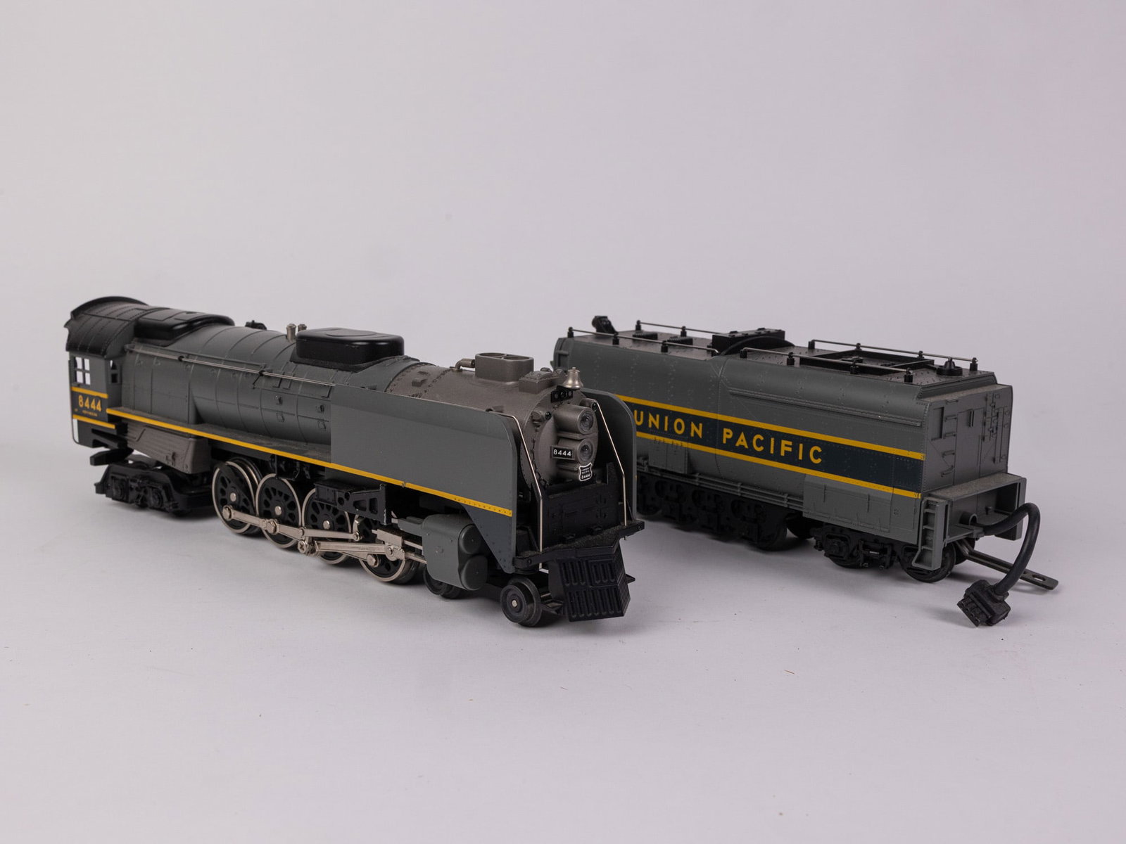 MTH RailKing Union Pacific 844 Locomotive and Tender: MTH RailKing Union Pacific 844 Locomotive and Tender Size 7" x 12" x 12" Literature Brooks Auction – Online Auction Terms & Conditions Contact: (856) 694-2960 | info@brooks.auction READ BEFORE