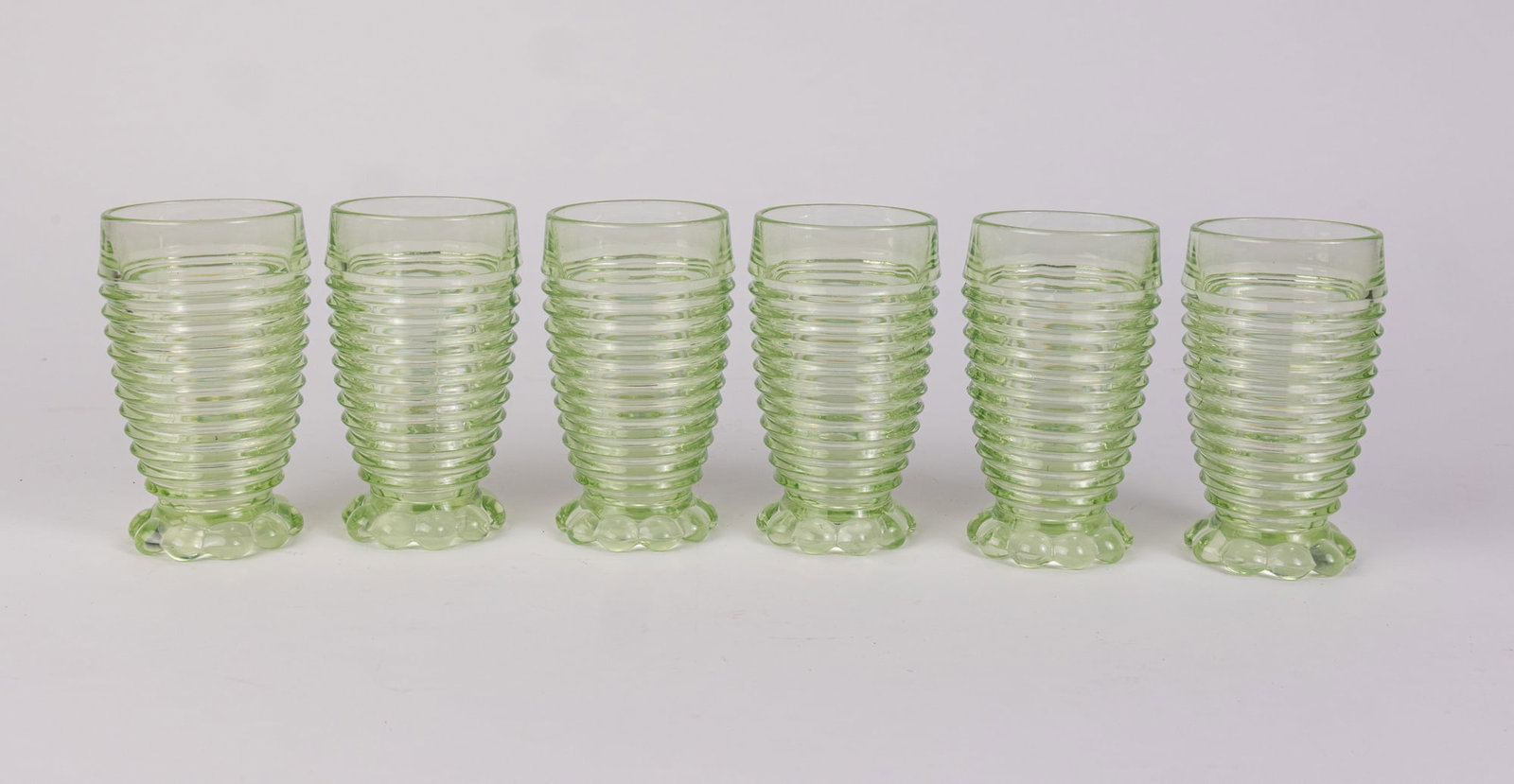 Set of Six Uranium Glass Anchor Hocking "Manhattan" Tumblers: Set of Six Uranium Glass Anchor Hocking "Manhattan" Tumblers Size 7" x 12" x 12" Literature Brooks Auction – Online Auction Terms & Conditions Contact: (856) 694-2960 | info@brooks.auction READ