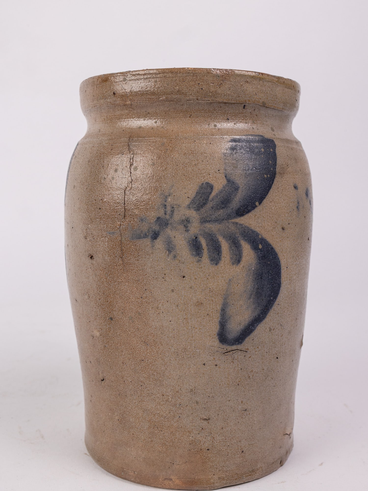 Cobalt Decorated Salt Glazed 7.5" Crock: Several small hairline cracks. Size 7.5" H Literature Brooks Auction – Online Auction Terms & Conditions Contact: (856) 694-2960 | info@brooks.auction READ BEFORE YOU BID: We want you to feel