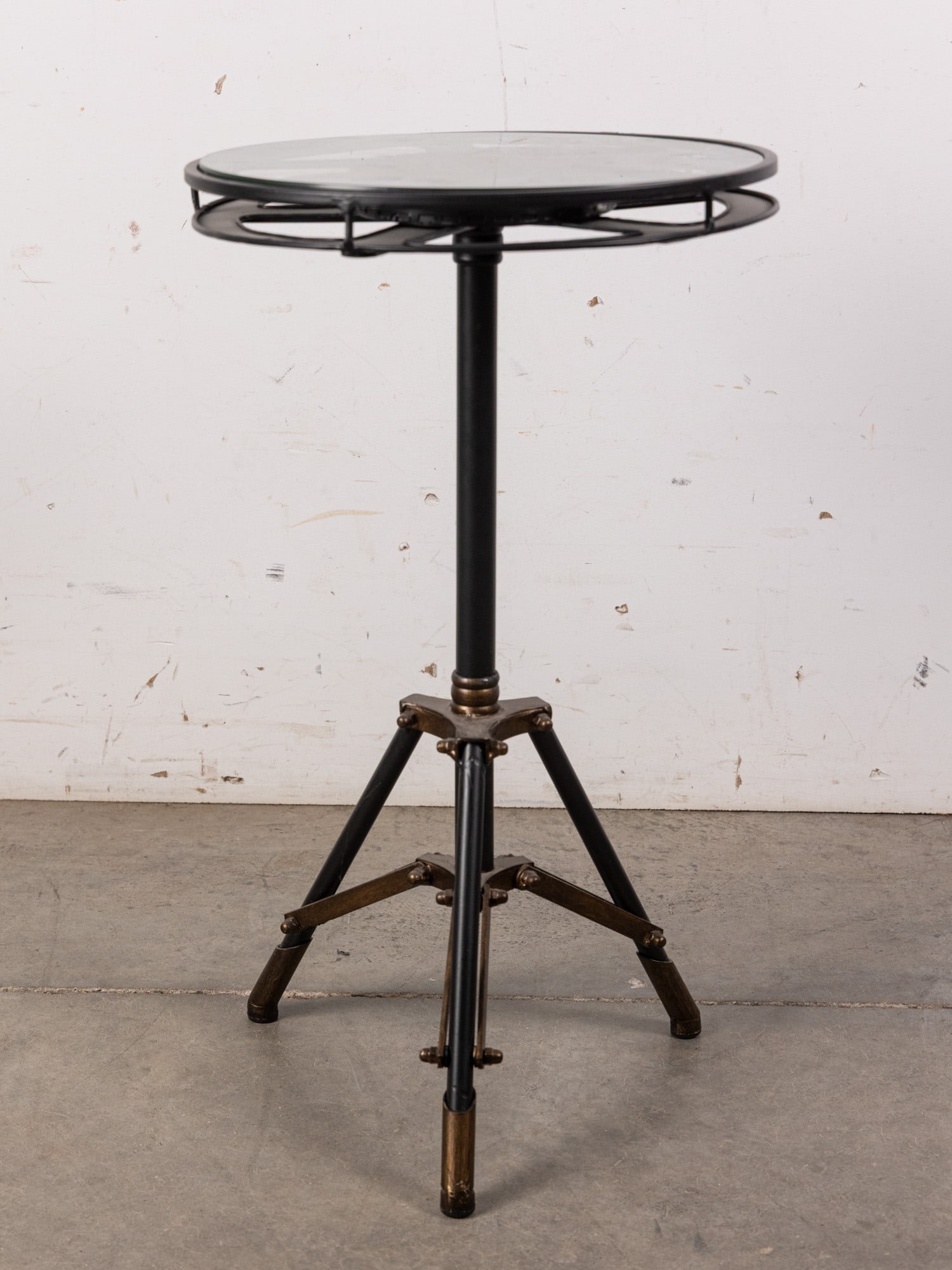Film Reel Pedestal Side Table: Film Reel Pedestal Side Table Size 25" H Literature Brooks Auction – Online Auction Terms & Conditions Contact: (856) 694-2960 | info@brooks.auction READ BEFORE YOU BID: We want you to feel