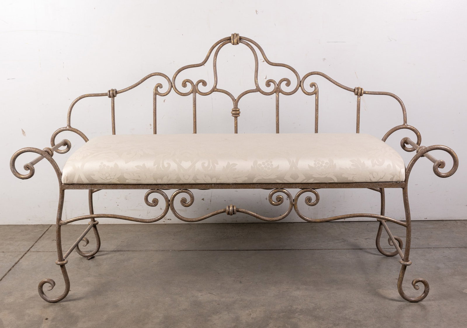 Wrought Iron Scrollwork Settee w/ White Upholstery: Wrought Iron Scrollwork Settee w/ White Upholstery Literature Brooks Auction – Online Auction Terms & Conditions Contact: (856) 694-2960 | info@brooks.auction READ BEFORE YOU BID: We want you