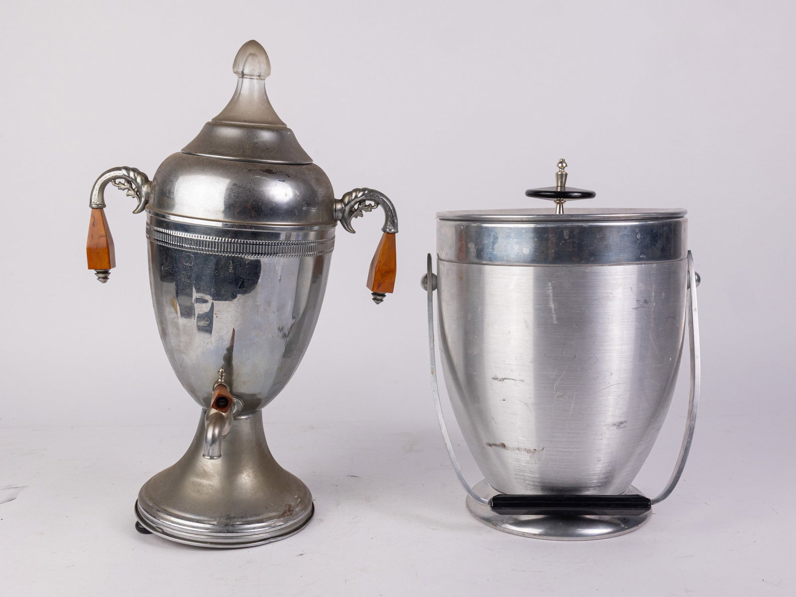 MCM Ice Bucket and Coffee Percolator: MCM Ice Bucket and Coffee Percolator Size 17" H Literature Brooks Auction – Online Auction Terms & Conditions Contact: (856) 694-2960 | info@brooks.auction READ BEFORE YOU BID: We want you to